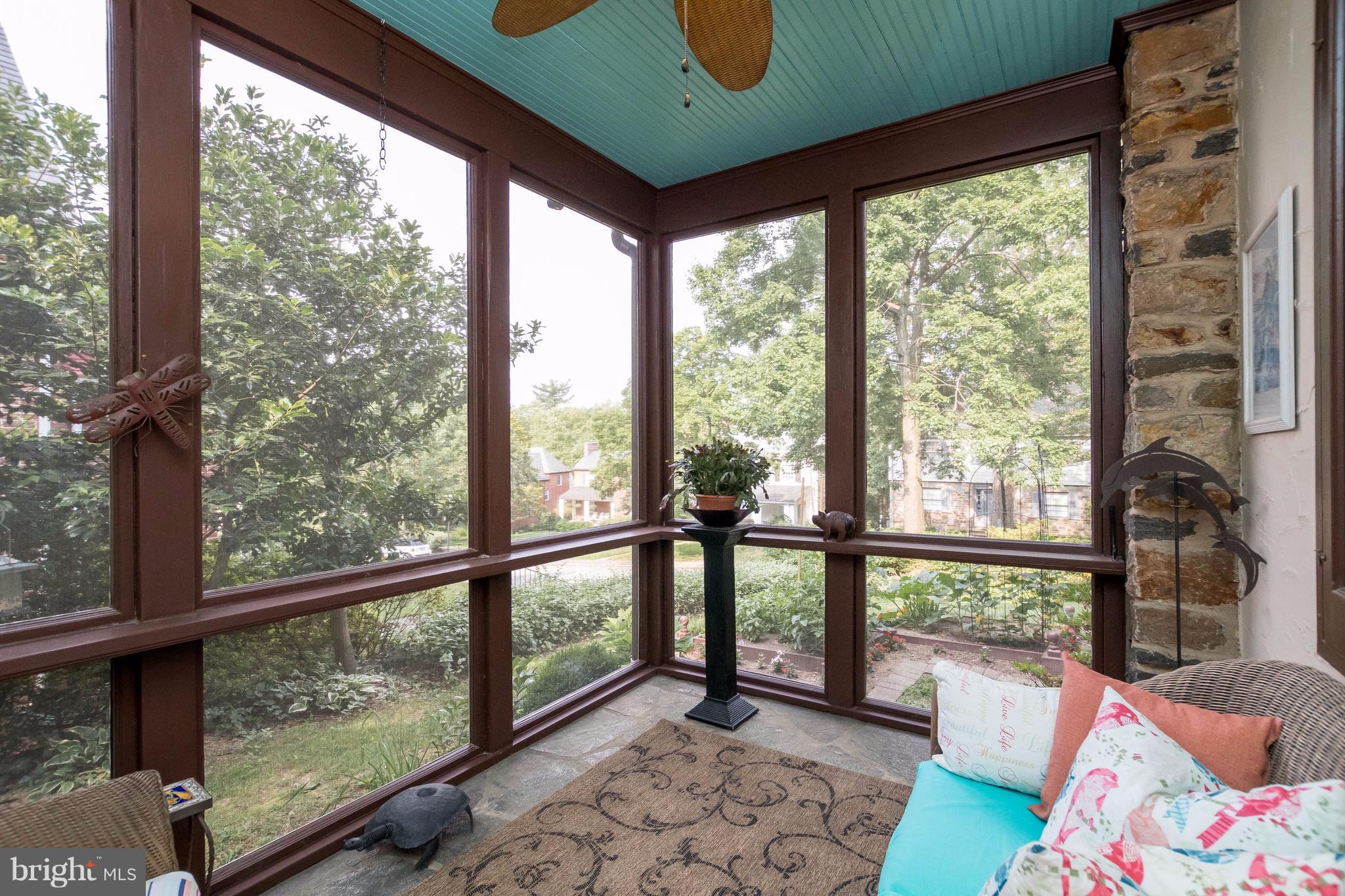 4129 Westview Road Baltimore, MD 21218 - Photo 11 of 30 COMFORTABLE SCREENED PORCH OFF OF LIVING ROOM