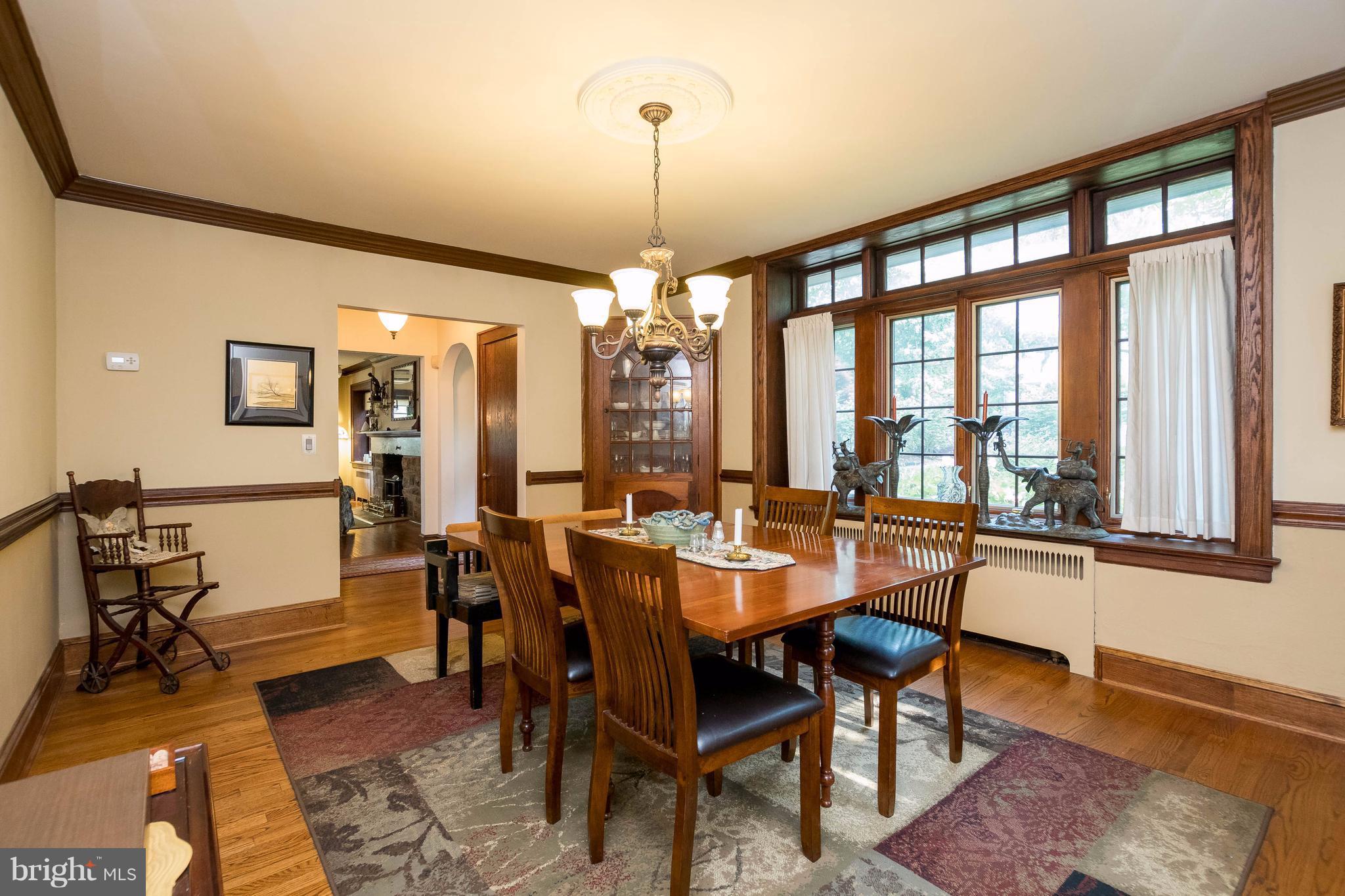 4129 Westview Road Baltimore, MD 21218 - Photo 13 of 30 BEAUTIFUL WOOD FLOORS AND WOOD CHAIR AND CROWN