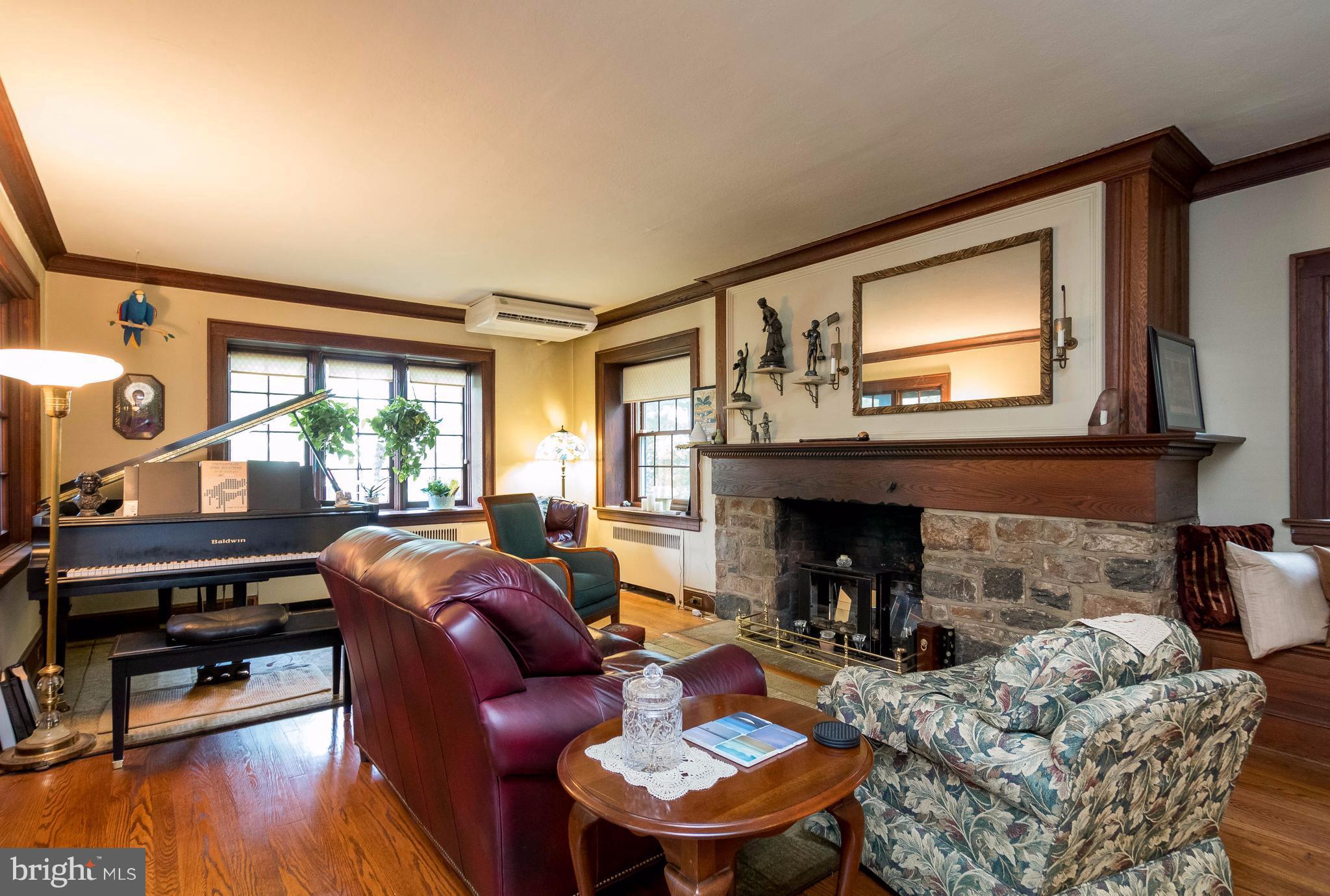 4129 Westview Road Baltimore, MD 21218 - Photo 7 of 30 LARGE LIVING ROOM W/STONE WOOD BURNING FIREPLACE