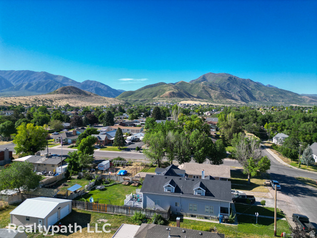 475 South 300 East Payson, UT 84651 - Photo 3 of 12 Residential property with a light blue exterior and dark gray roof