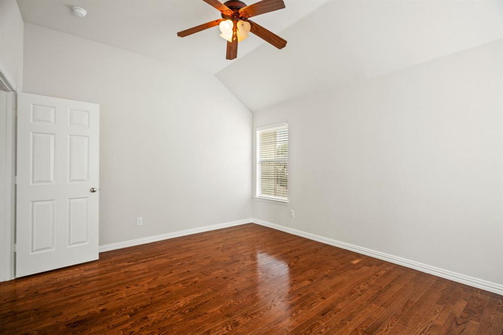 2012 Burnside Drive Allen, TX 75013 - Photo 34 of 40 wooden floor in an empty room with a window