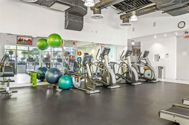 a view of a room with gym equipment