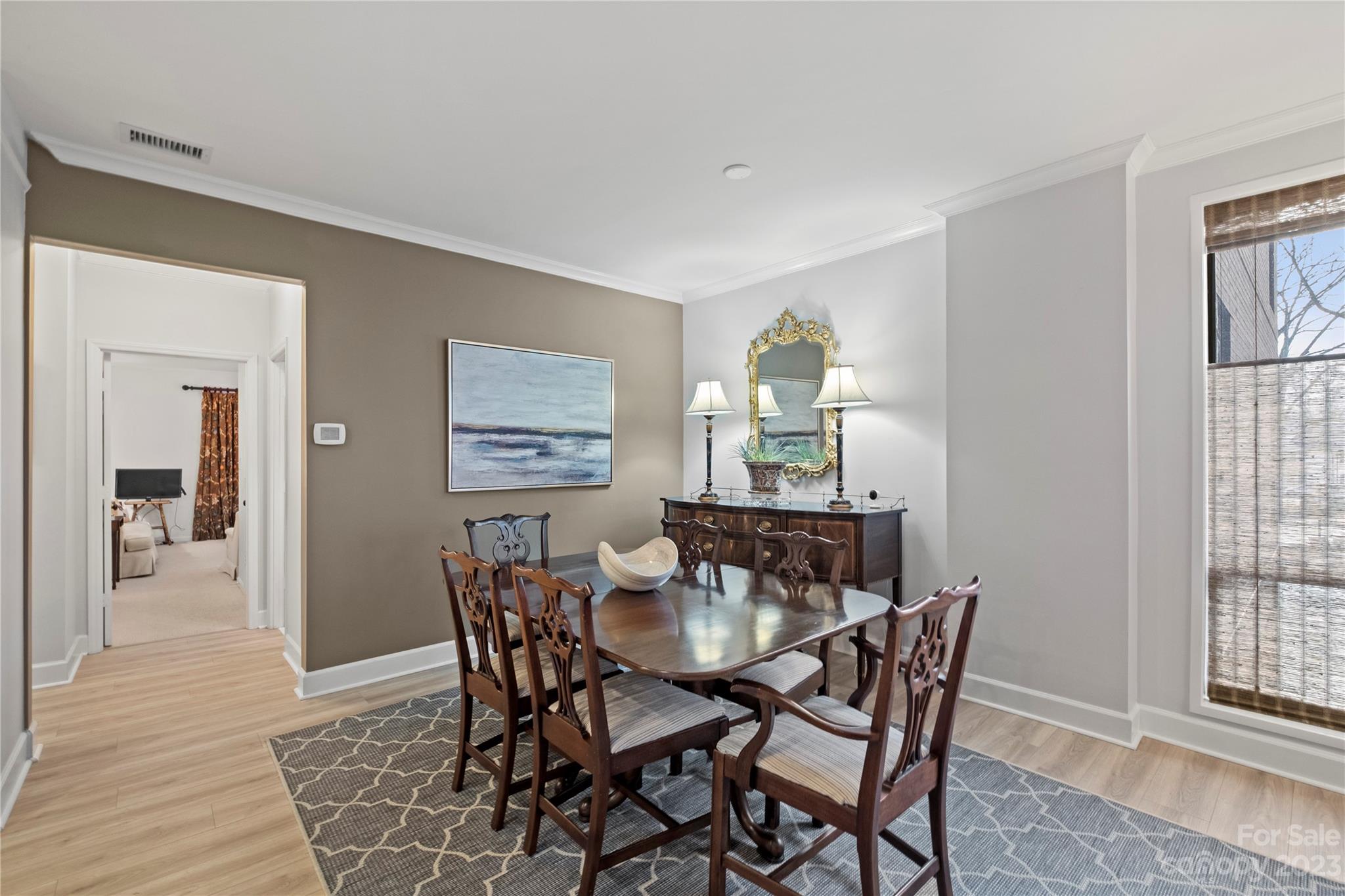 912 Cherokee Road Charlotte, NC 28207 - Photo 12 of 32 a dining room with furniture and window