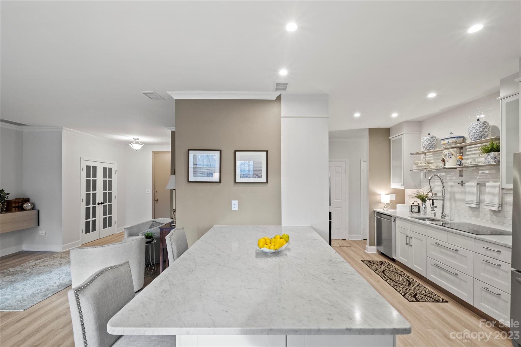 912 Cherokee Road Charlotte, NC 28207 - Photo 13 of 32 a view of living room with stainless steel appliances granite countertop furniture and a living room view