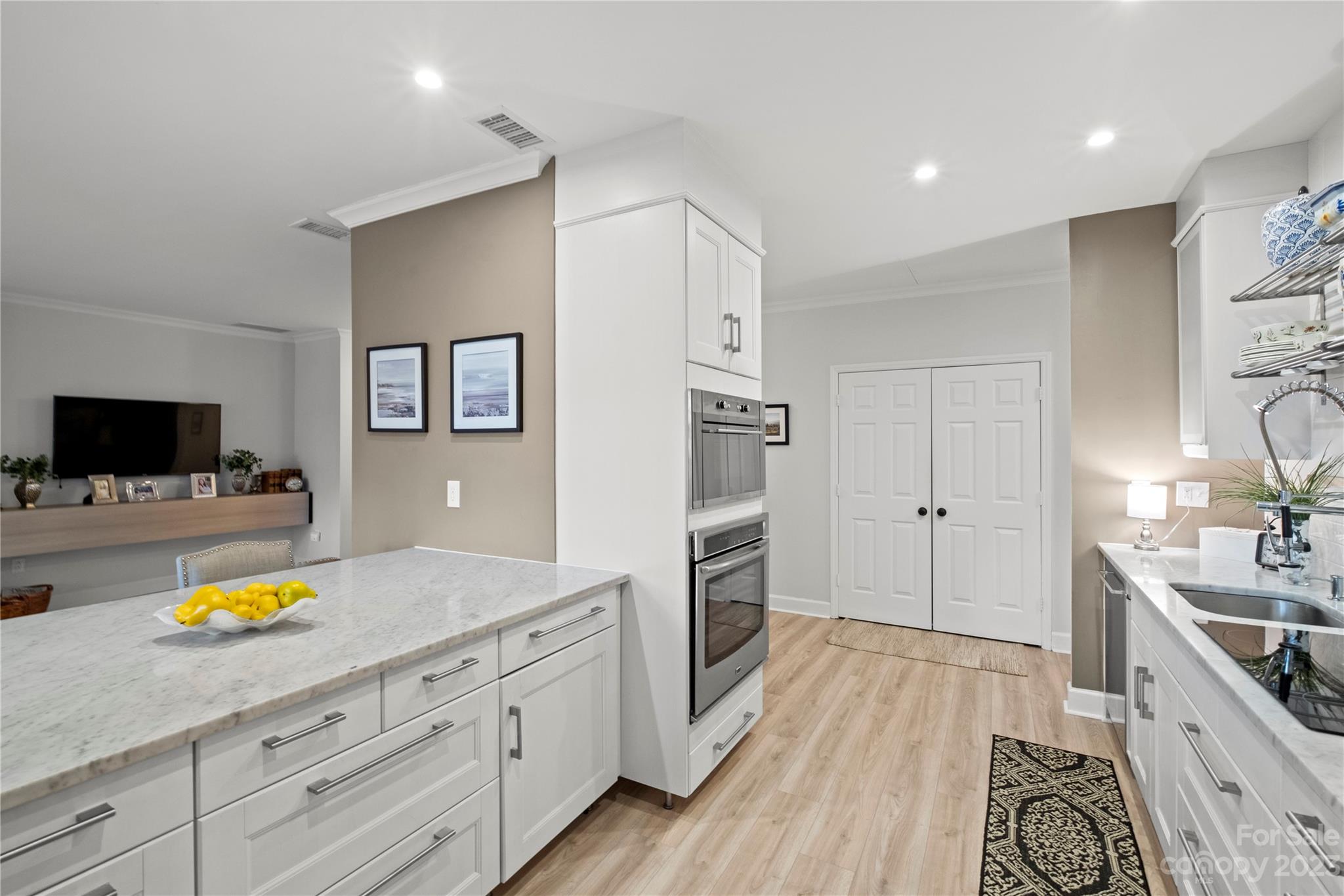 912 Cherokee Road Charlotte, NC 28207 - Photo 14 of 32 a kitchen with a sink and a stove top oven