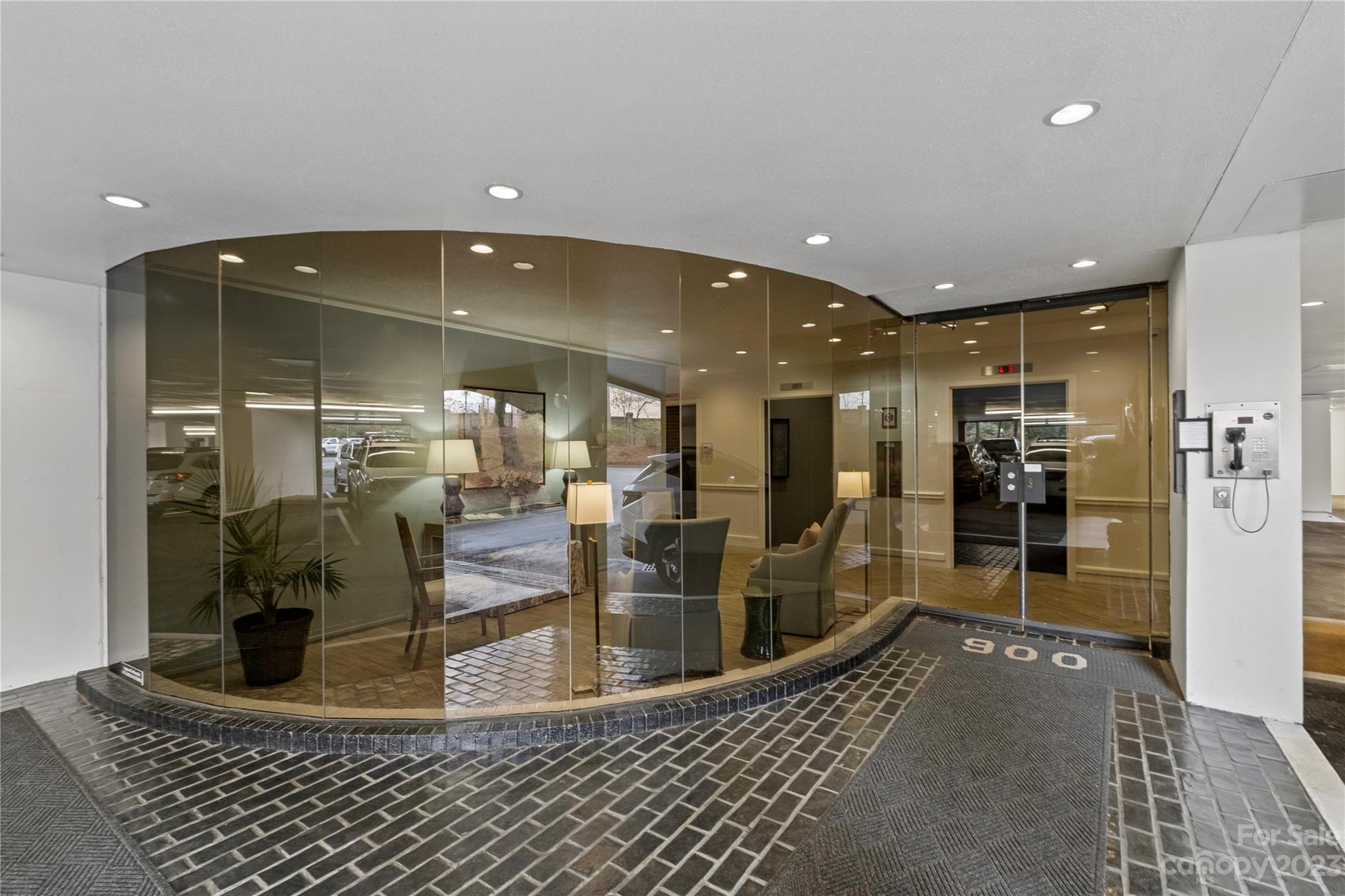 912 Cherokee Road Charlotte, NC 28207 - Photo 2 of 32 a view of a living room and entry way