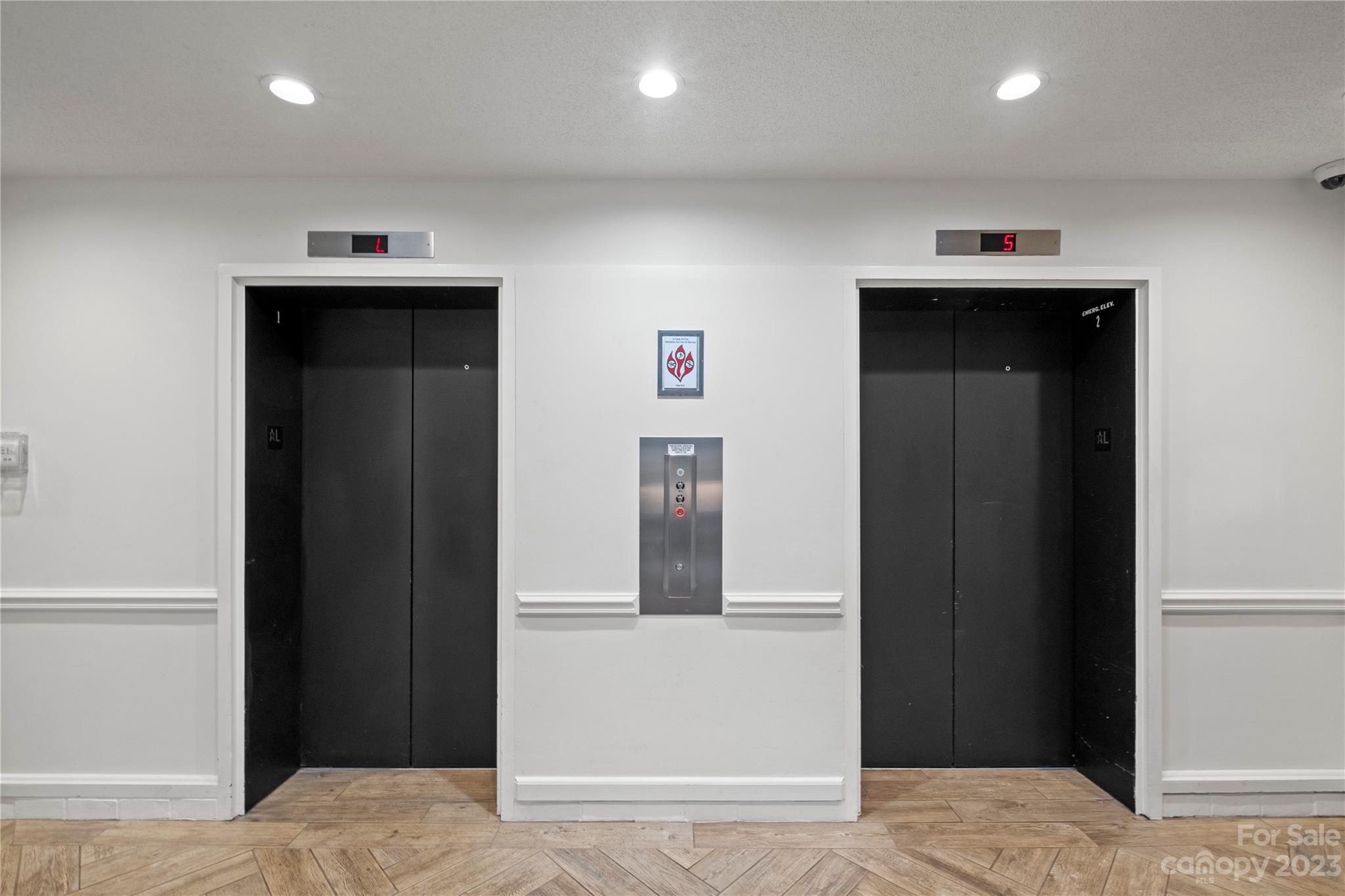 912 Cherokee Road Charlotte, NC 28207 - Photo 5 of 32 a view of hallway with cabinet