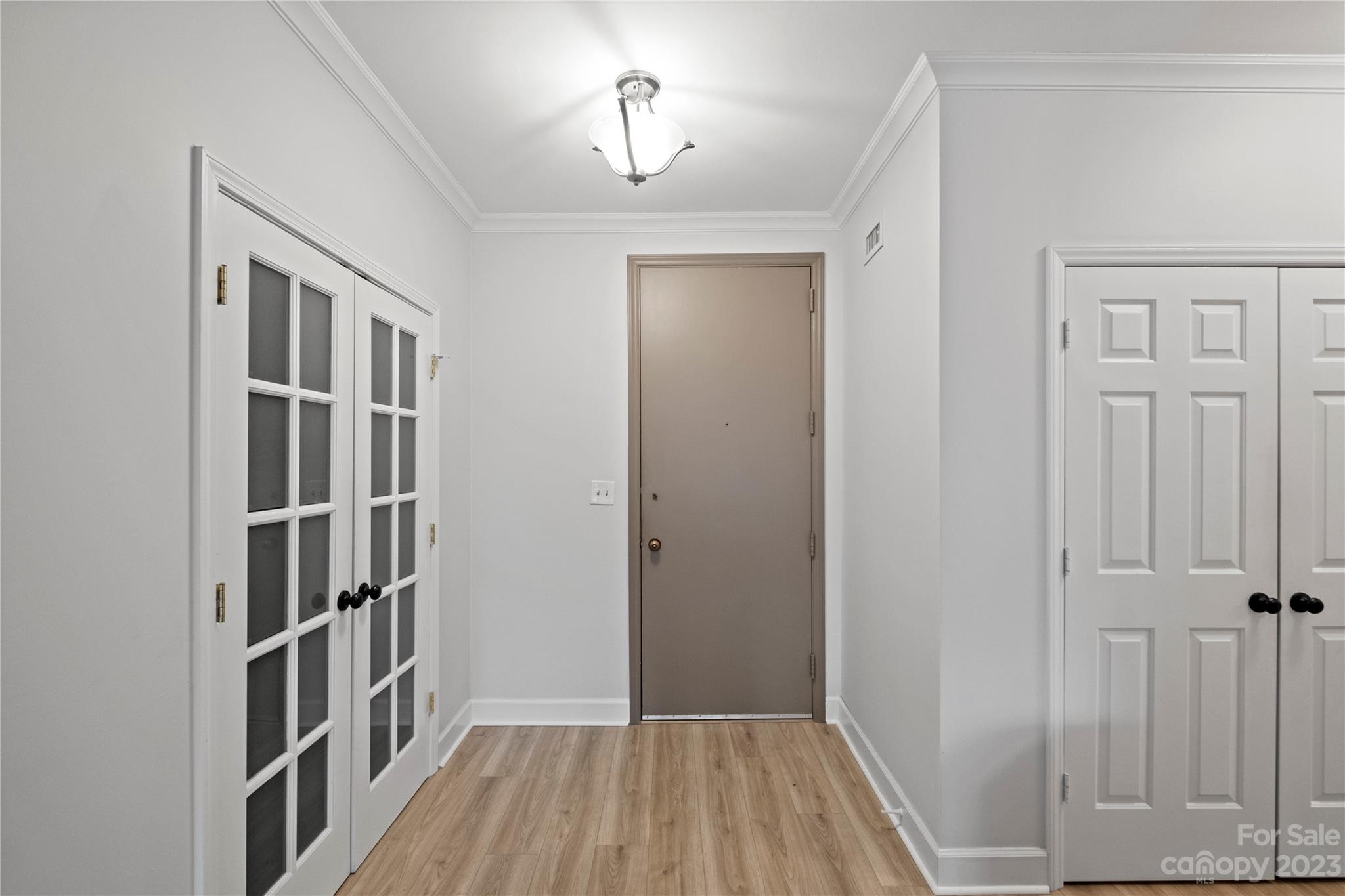 912 Cherokee Road Charlotte, NC 28207 - Photo 7 of 32 a view of livingroom with hallway and stairs