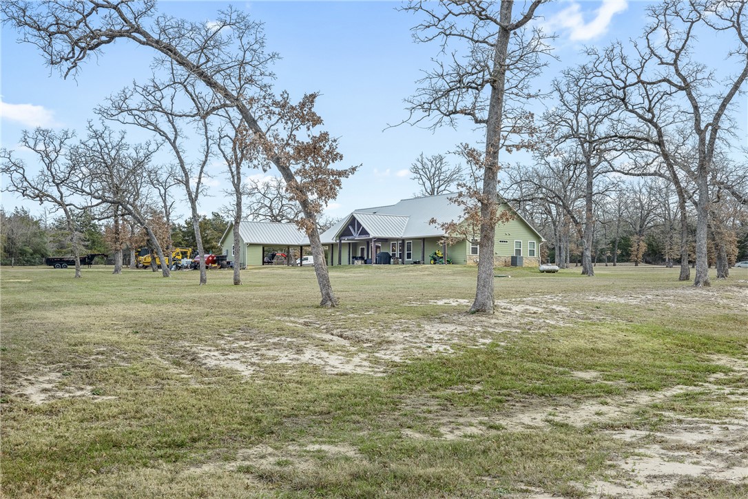 7440 Fm 39 Road South North Zulch, TX 77872 - Photo 11 of 50 a view of a tree in front of a house