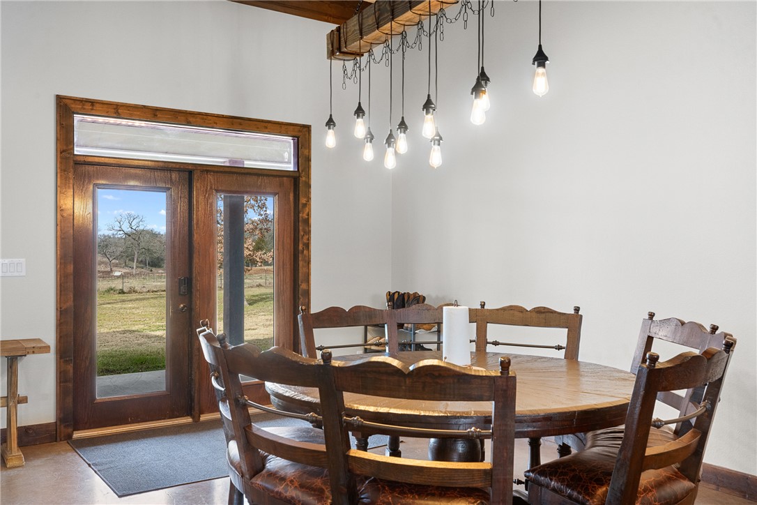 7440 Fm 39 Road South North Zulch, TX 77872 - Photo 17 of 50 a view of a dining room with furniture and window