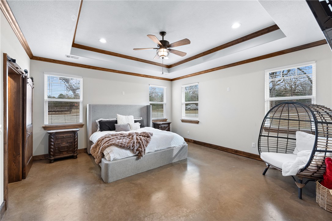 7440 Fm 39 Road South North Zulch, TX 77872 - Photo 21 of 50 a bedroom with bed and window