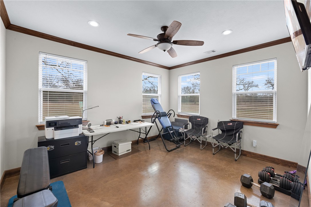 7440 Fm 39 Road South North Zulch, TX 77872 - Photo 32 of 50 a living room with furniture stairs and a window