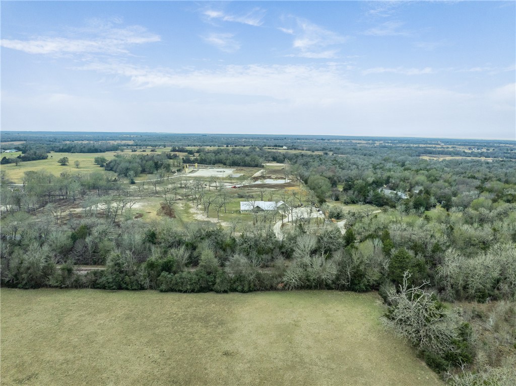 7440 Fm 39 Road South North Zulch, TX 77872 - Photo 45 of 50 an aerial view of a residential houses with outdoor space and trees