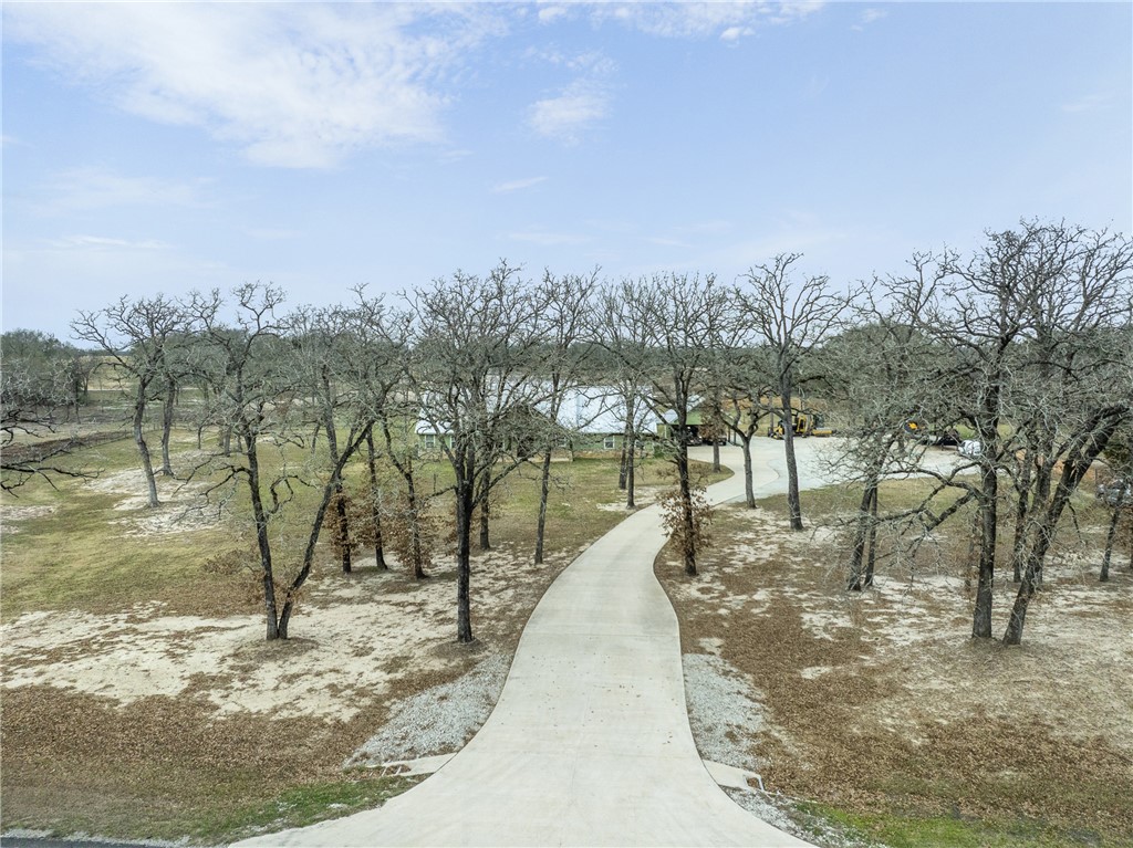 7440 Fm 39 Road South North Zulch, TX 77872 - Photo 49 of 50 a view of a swimming pool with an outdoor seating