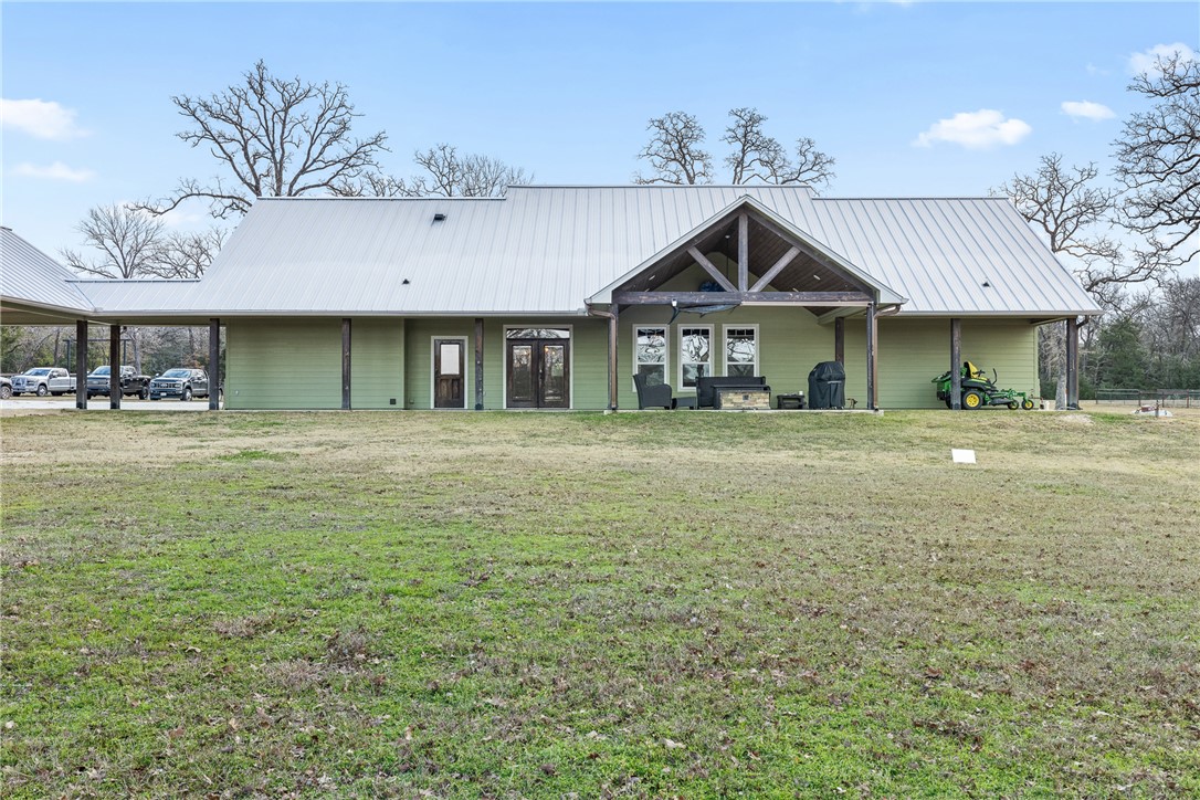 7440 Fm 39 Road South North Zulch, TX 77872 - Photo 9 of 50 a front view of a house with garden