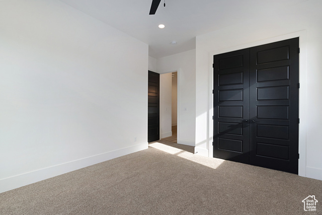3145 Snow Cyn Road Hurricane, UT 84737 - Photo 12 of 38 Unfurnished bedroom featuring carpet floors, recessed lighting, a closet, and a ceiling fan