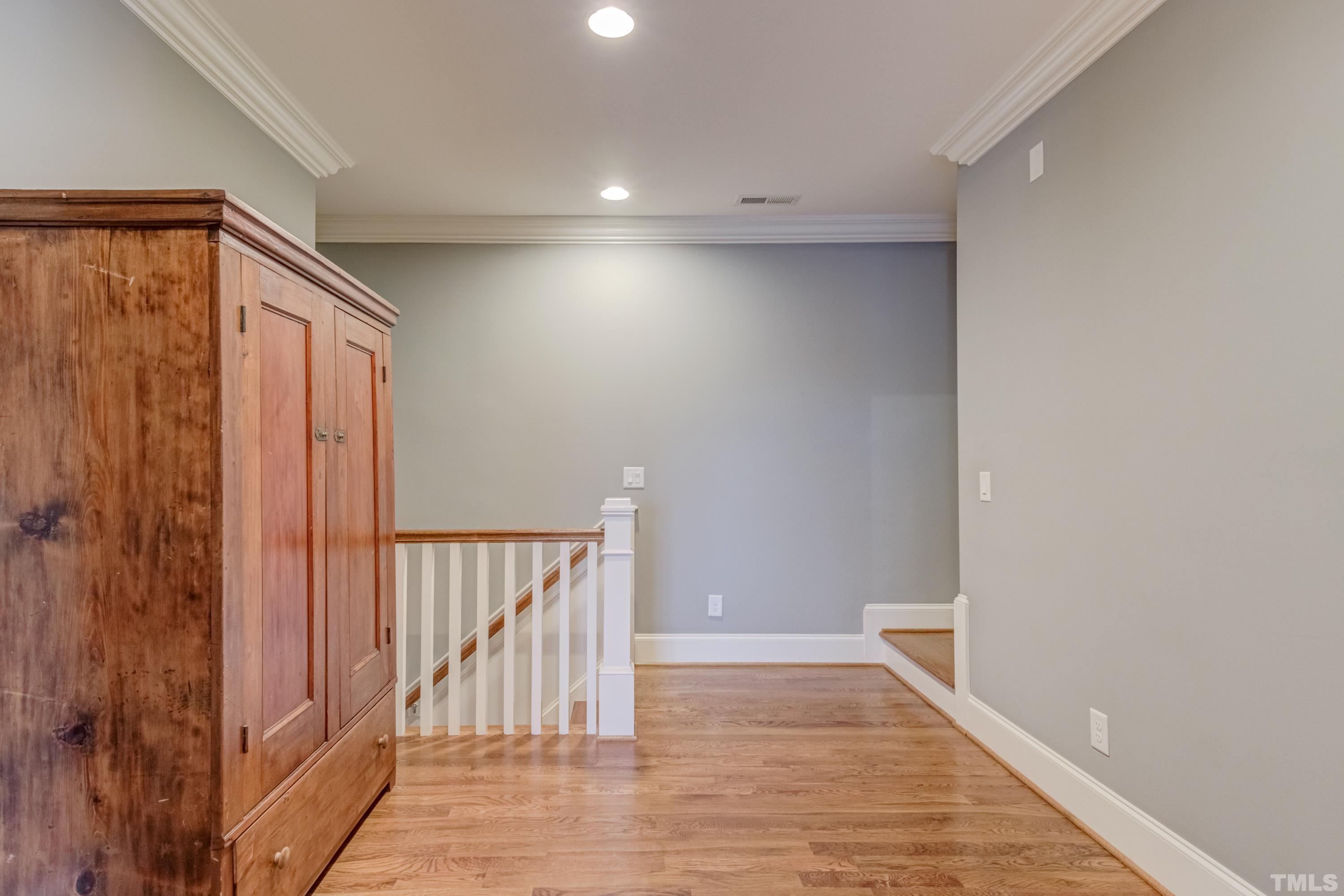 4128 English Garden Way Raleigh, NC 27612 - Photo 54 of 70 a view of entryway with wooden floor