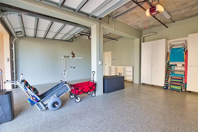 a view of a house with swimming pool and sitting area