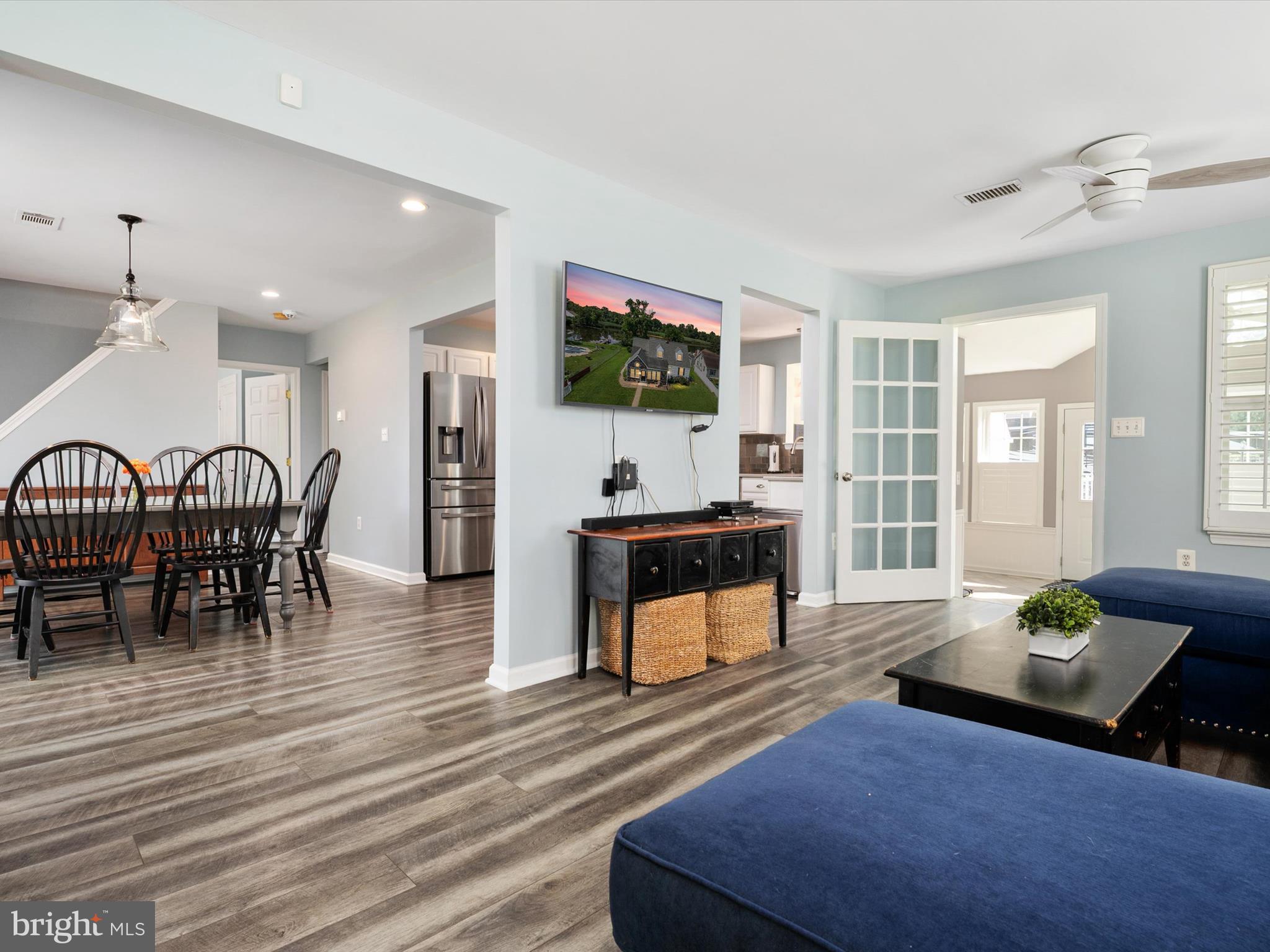 8426 Park Road Pasadena, MD 21122 - Photo 13 of 59 a living room with furniture and a flat screen tv