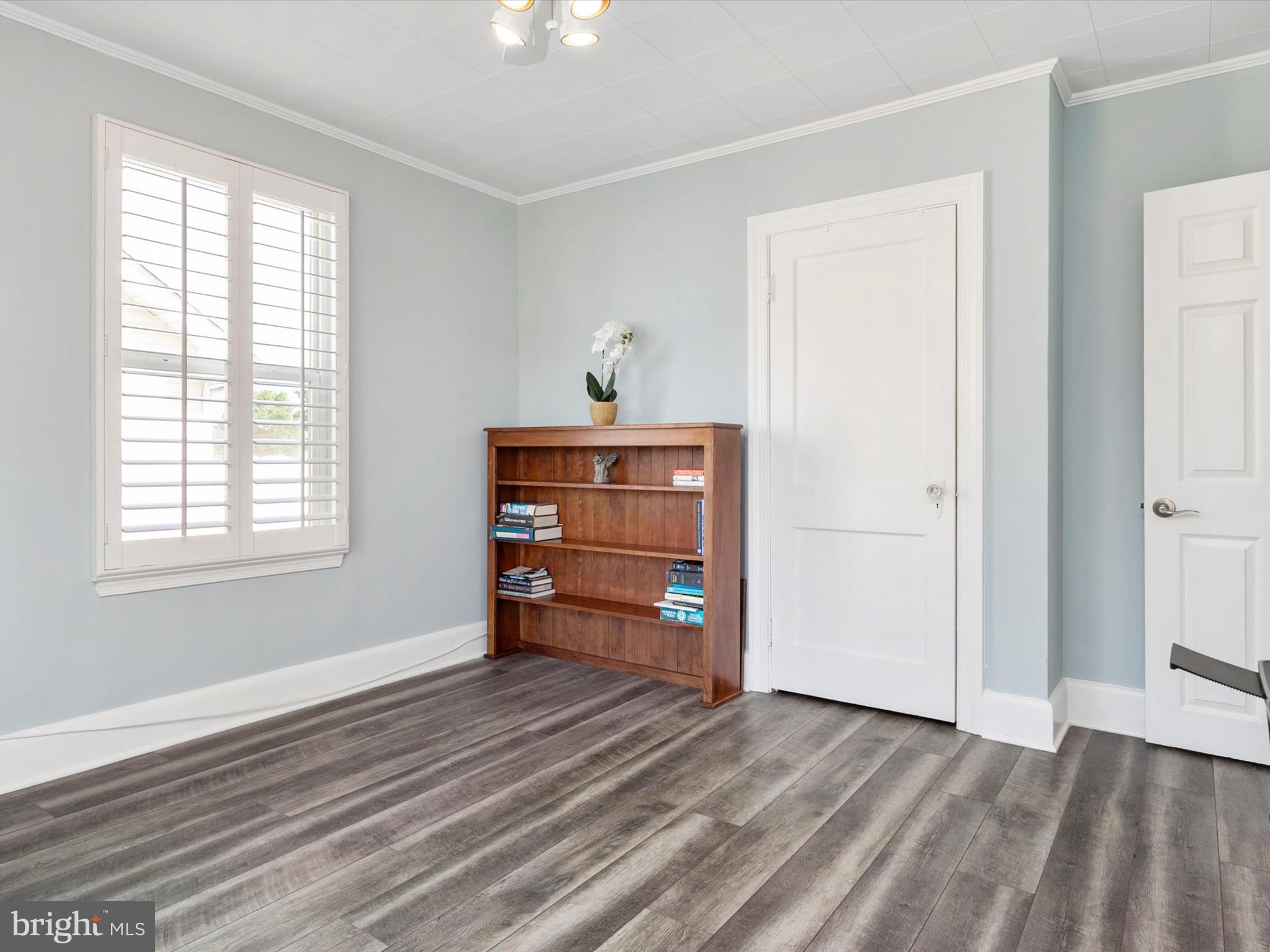 8426 Park Road Pasadena, MD 21122 - Photo 17 of 59 a view of room with window and cabinet