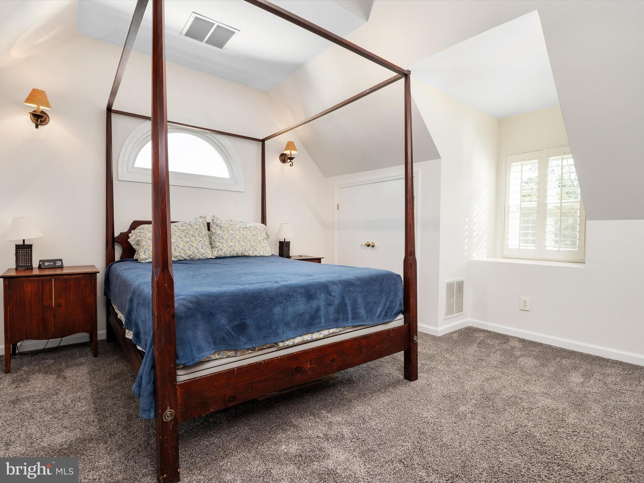 8426 Park Road Pasadena, MD 21122 - Photo 22 of 59 a bedroom with a bed and a window