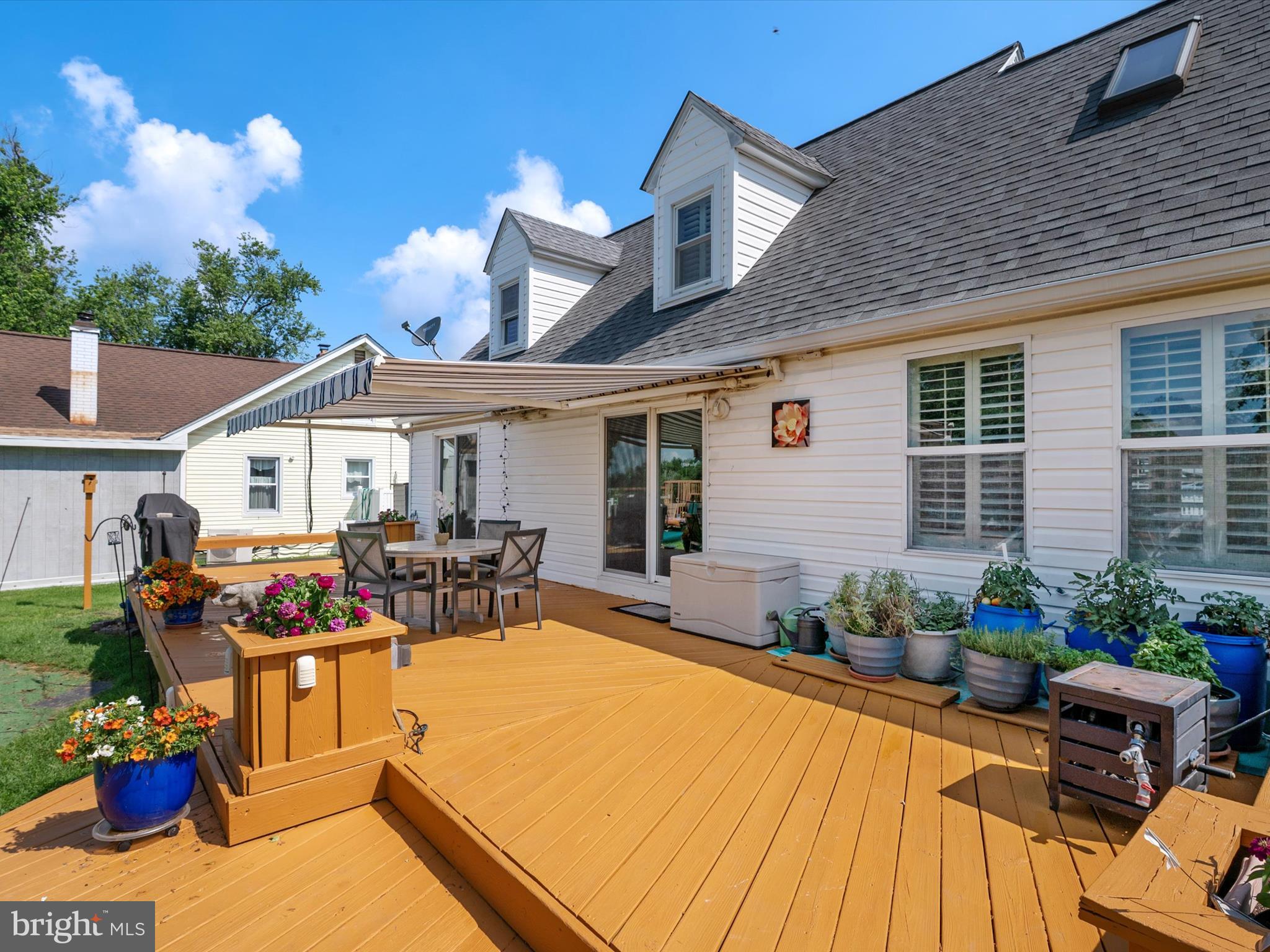 8426 Park Road Pasadena, MD 21122 - Photo 28 of 59 a view of a house with pool fire pit and chairs