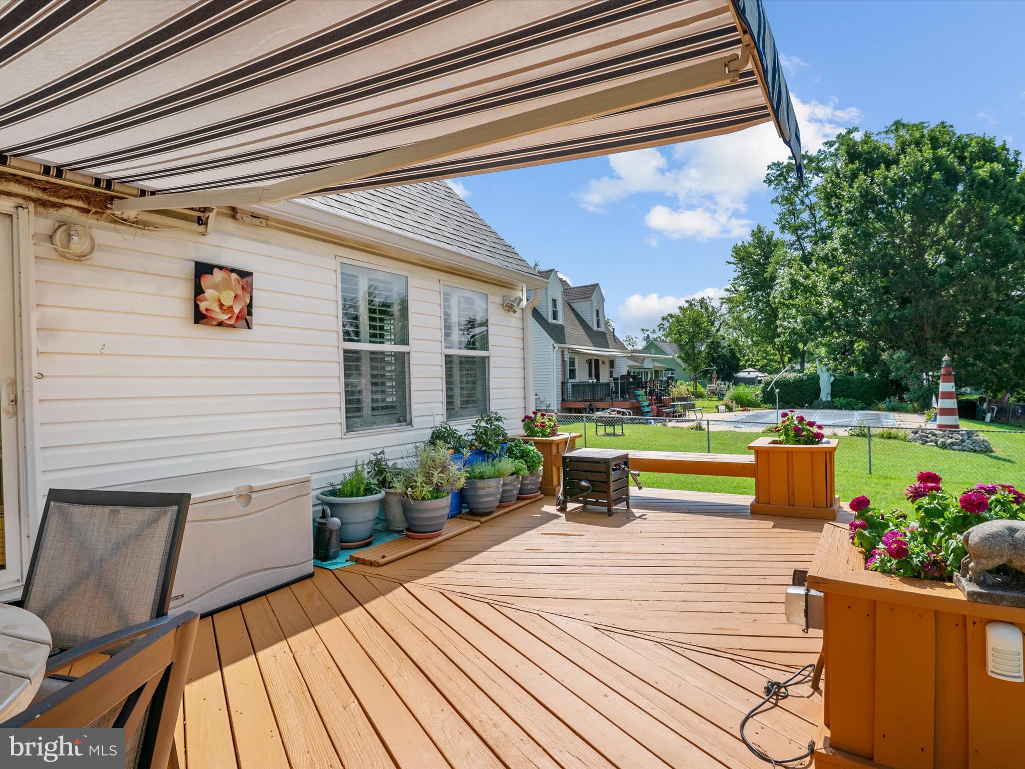 8426 Park Road Pasadena, MD 21122 - Photo 30 of 59 a view of a house with swimming pool and sitting area