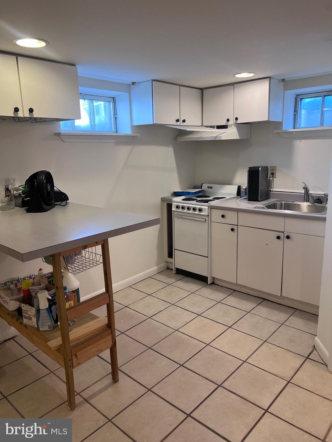 8426 Park Road Pasadena, MD 21122 - Photo 31 of 59 a kitchen with granite countertop cabinets and sink