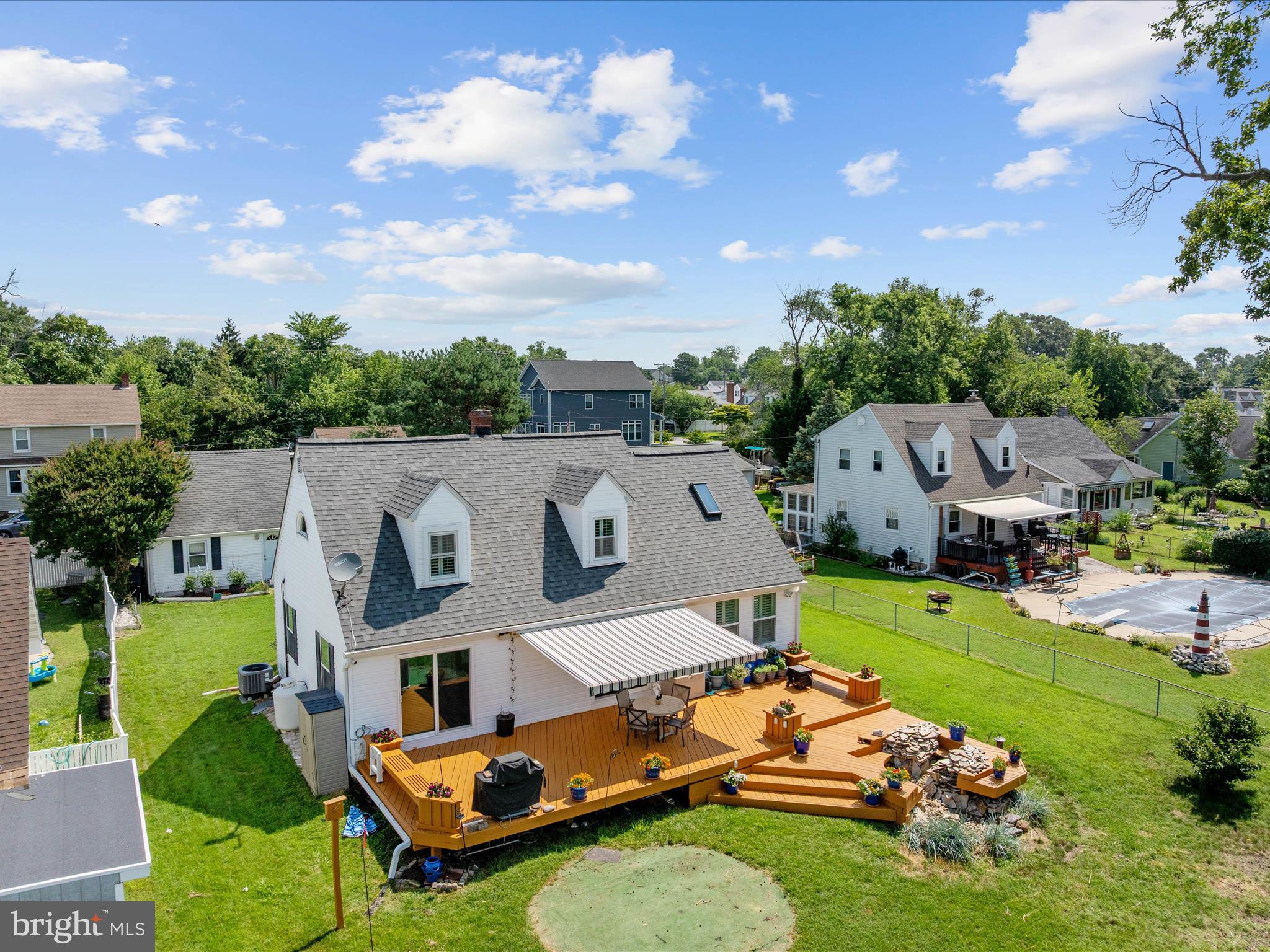 8426 Park Road Pasadena, MD 21122 - Photo 35 of 59 an aerial view of a house with swimming pool and a yard