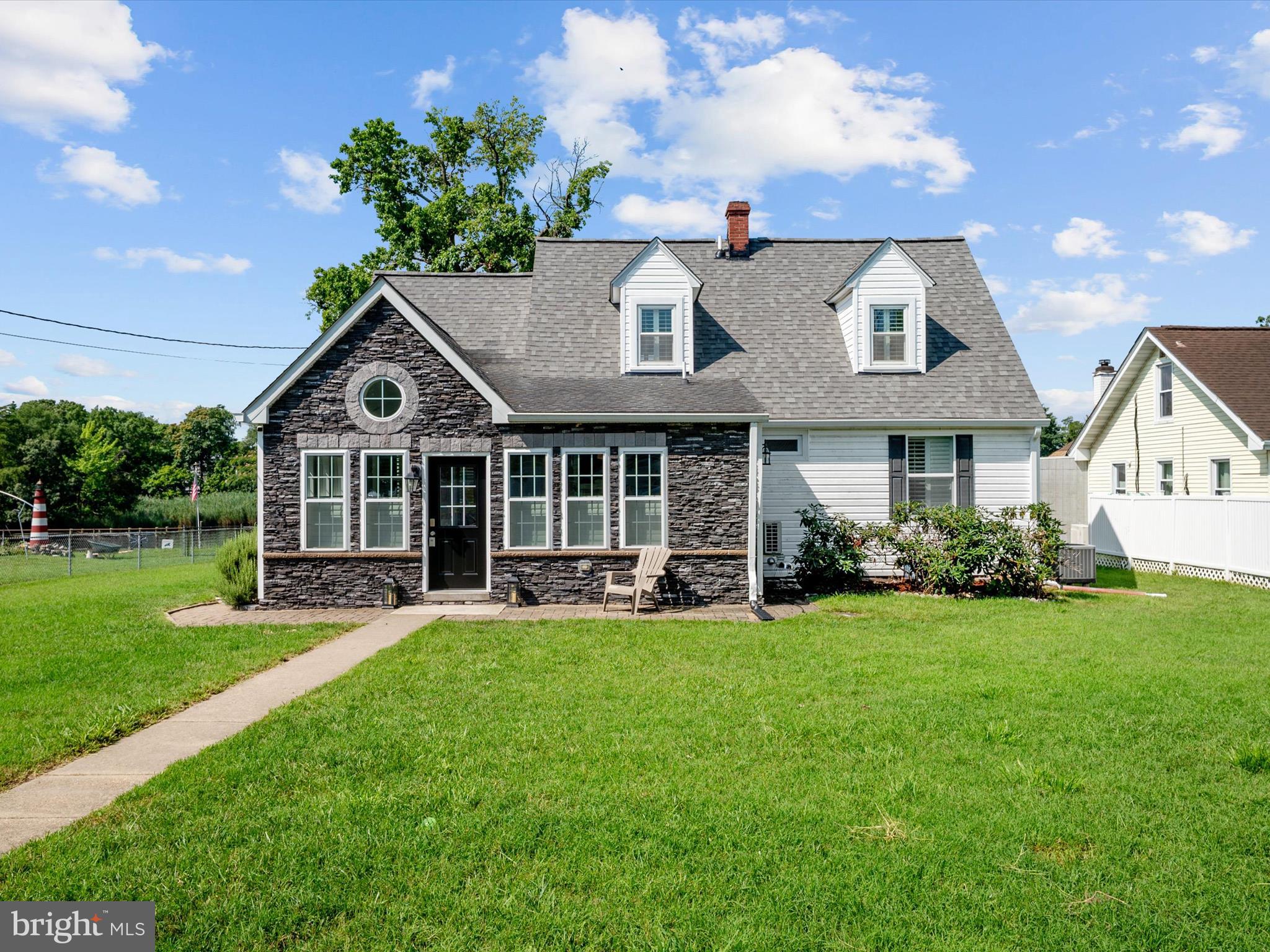 8426 Park Road Pasadena, MD 21122 - Photo 37 of 59 a front view of a house with a yard