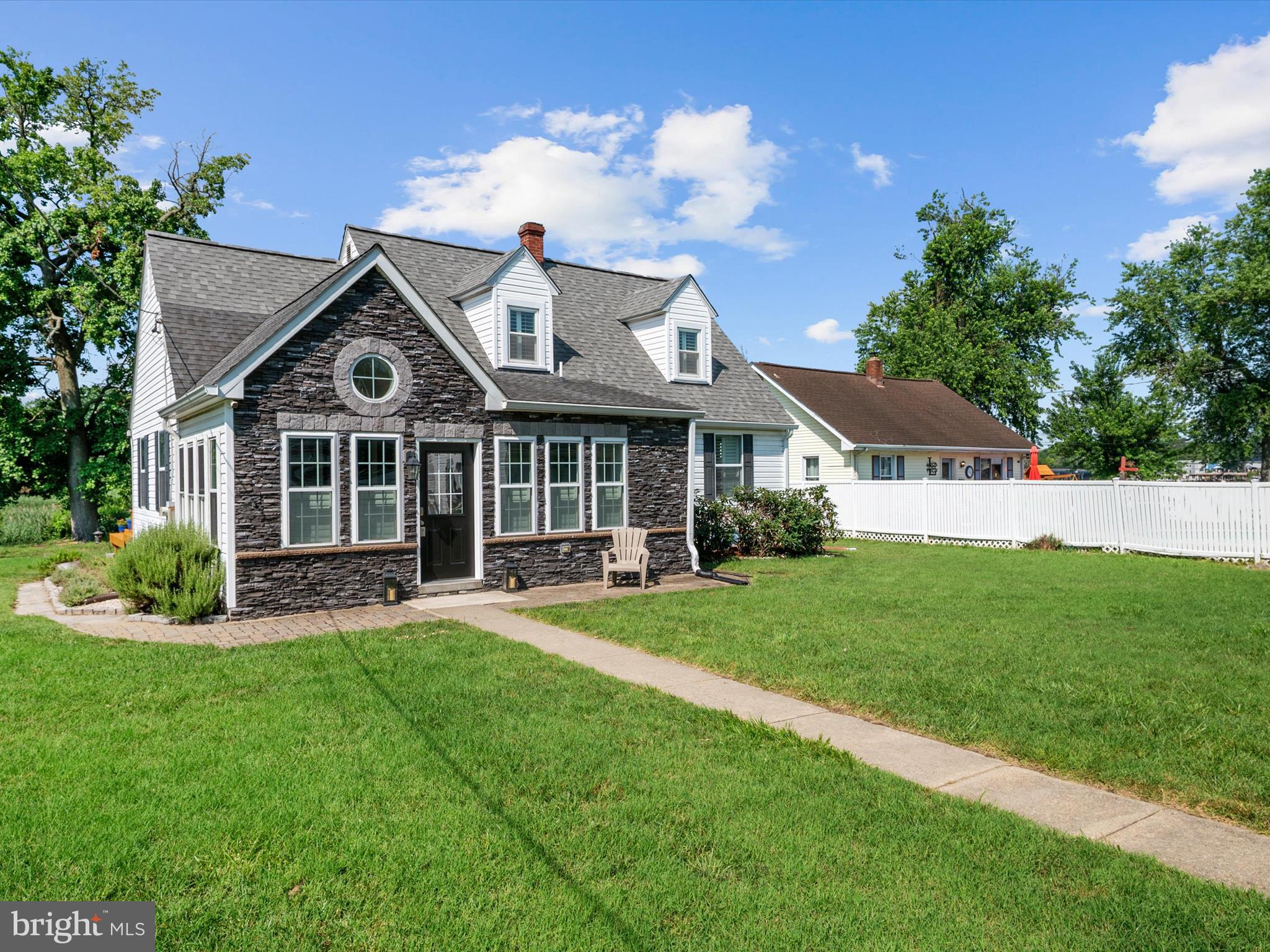 8426 Park Road Pasadena, MD 21122 - Photo 38 of 59 a view of a house with a yard and sitting area