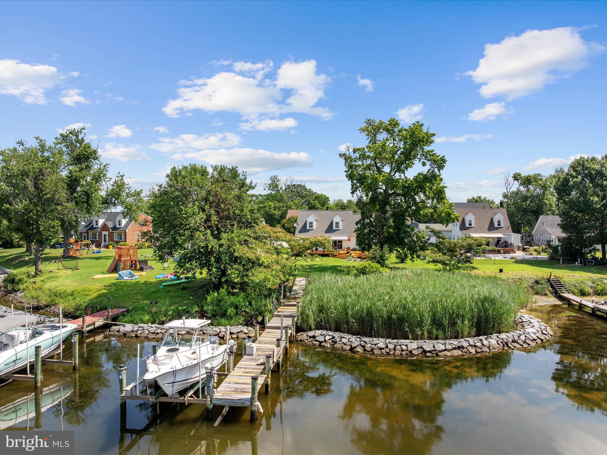 8426 Park Road Pasadena, MD 21122 - Photo 47 of 59 a view of a garden with lawn chairs