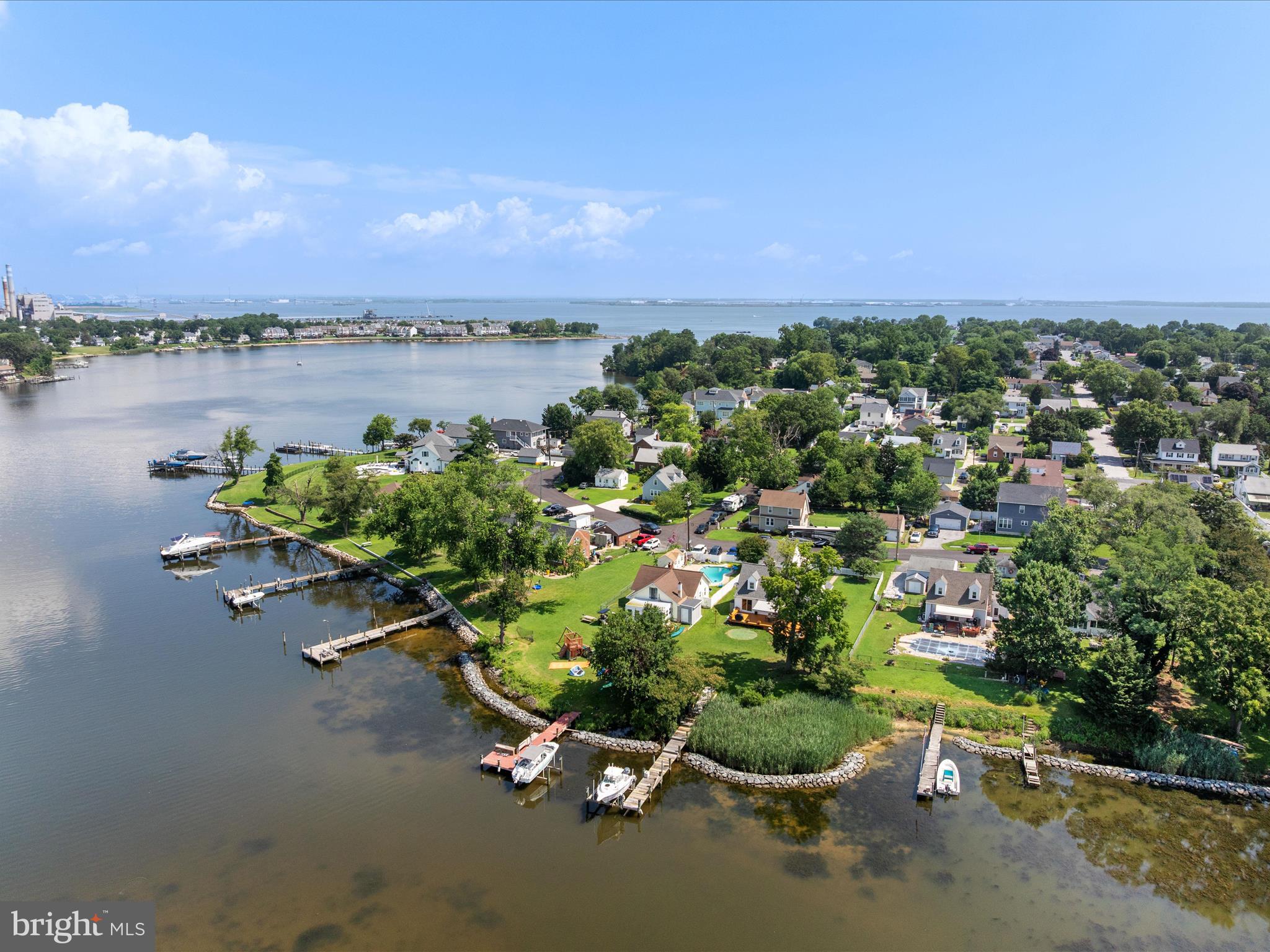 8426 Park Road Pasadena, MD 21122 - Photo 49 of 59 a view of a lake with a table and chairs