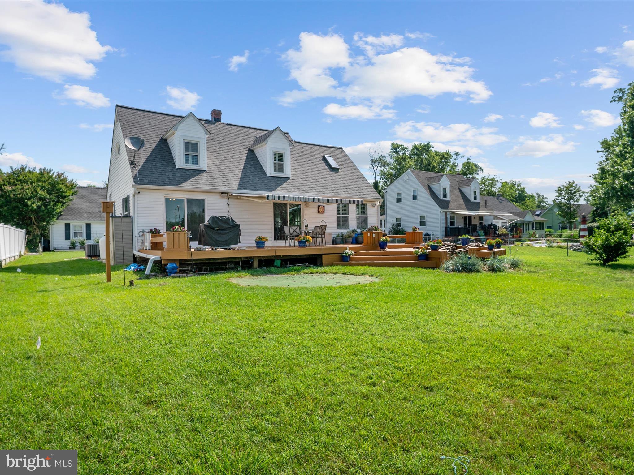 8426 Park Road Pasadena, MD 21122 - Photo 52 of 59 a view of a big house with a big yard and large trees