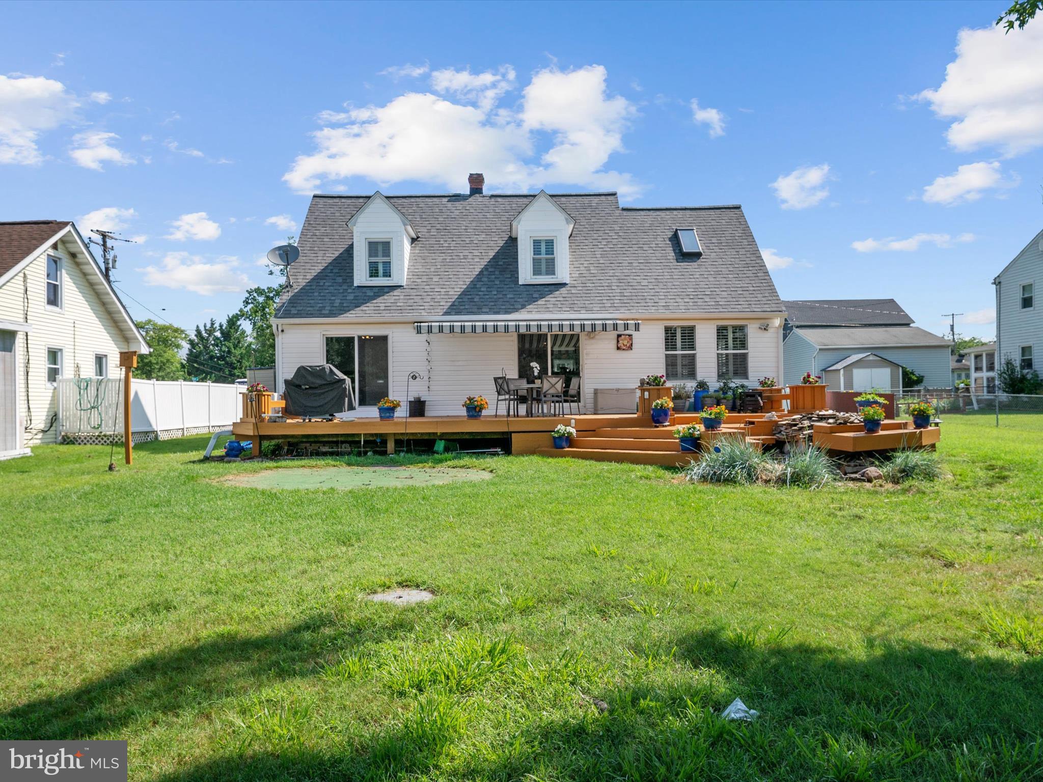 8426 Park Road Pasadena, MD 21122 - Photo 53 of 59 a view of a house with a yard and sitting area