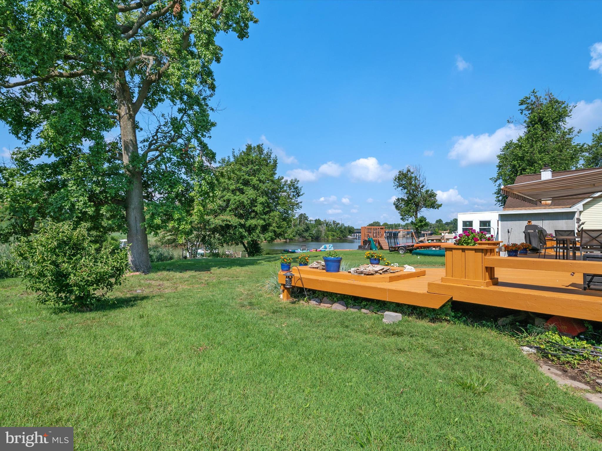 8426 Park Road Pasadena, MD 21122 - Photo 55 of 59 a outdoor view with a bench and a garden