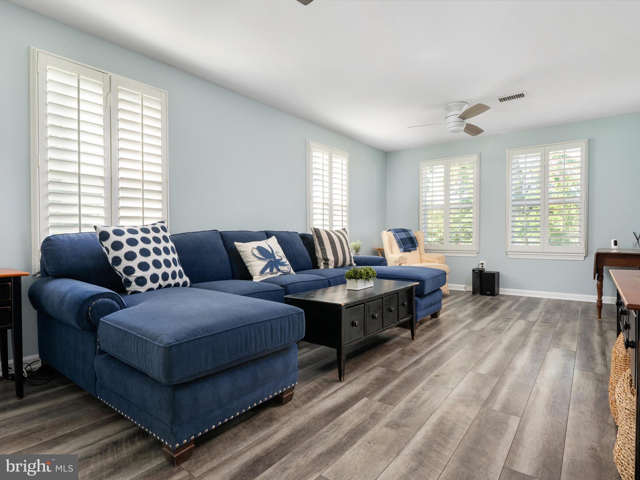 8426 Park Road Pasadena, MD 21122 - Photo 10 of 59 a living room with furniture and a large window