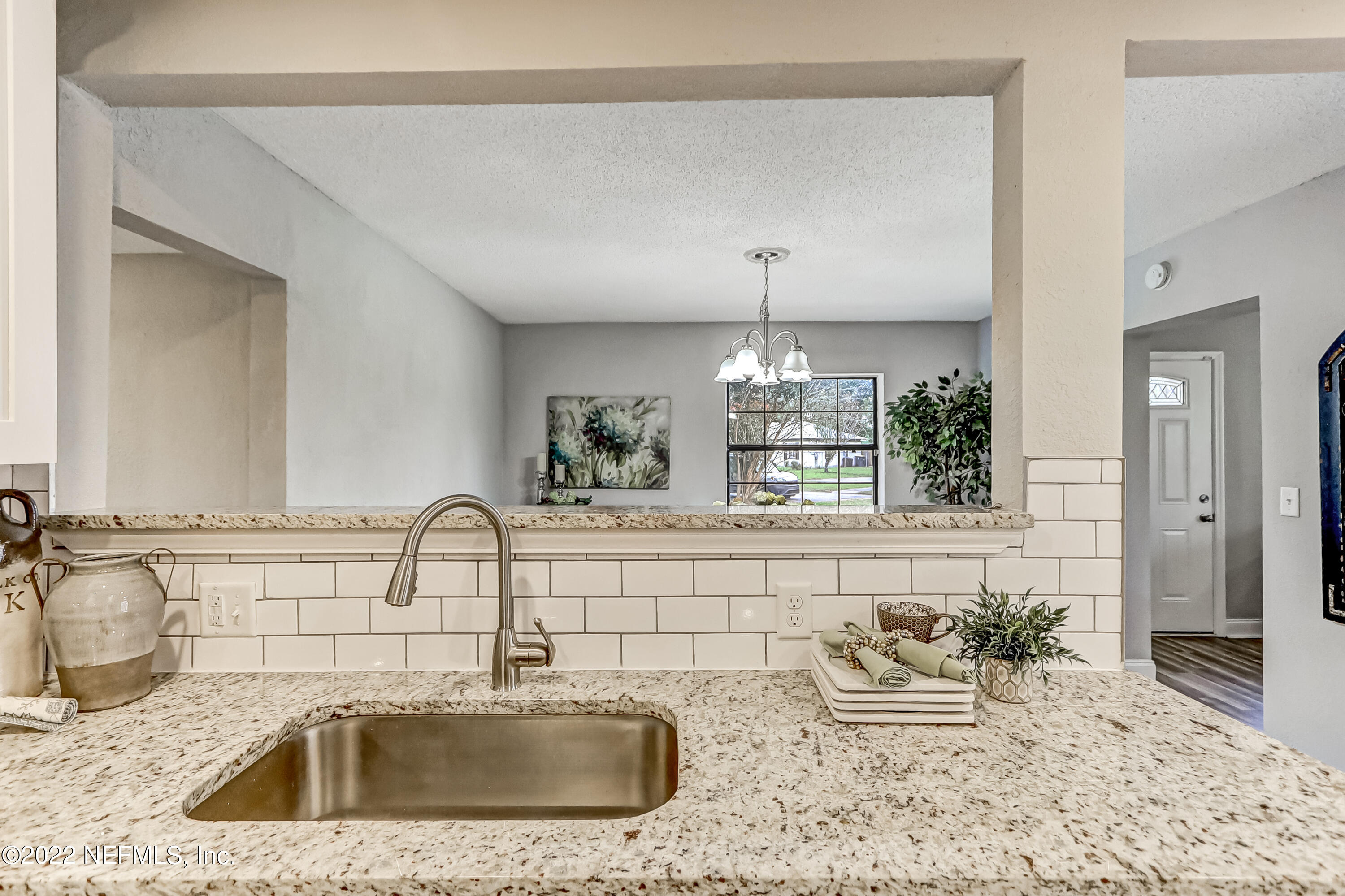 3607 Basil Road Jacksonville, FL 32207 - Photo 15 of 31 a close view of two sink and a large mirror