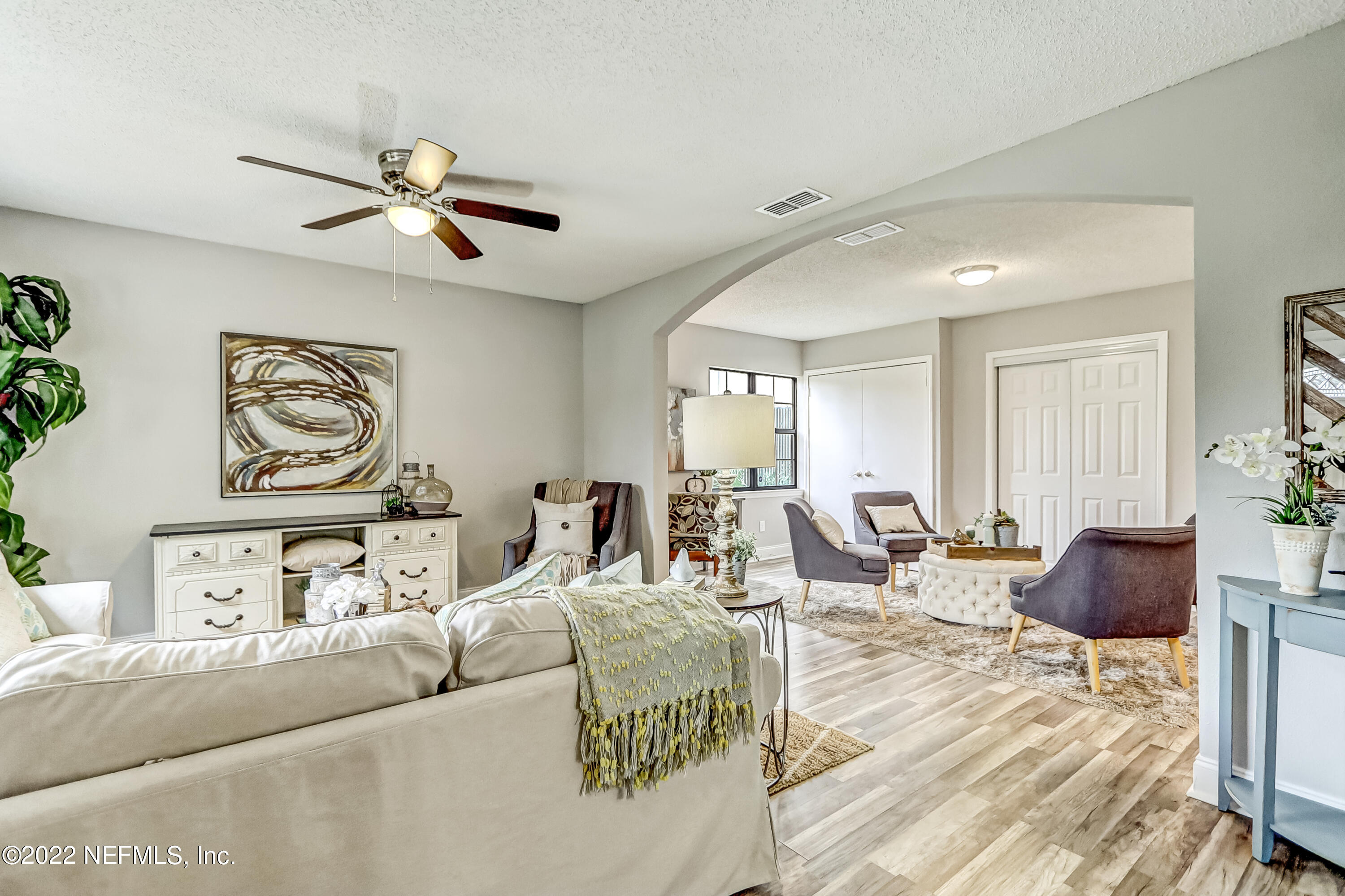 3607 Basil Road Jacksonville, FL 32207 - Photo 3 of 31 a living room with furniture and a window