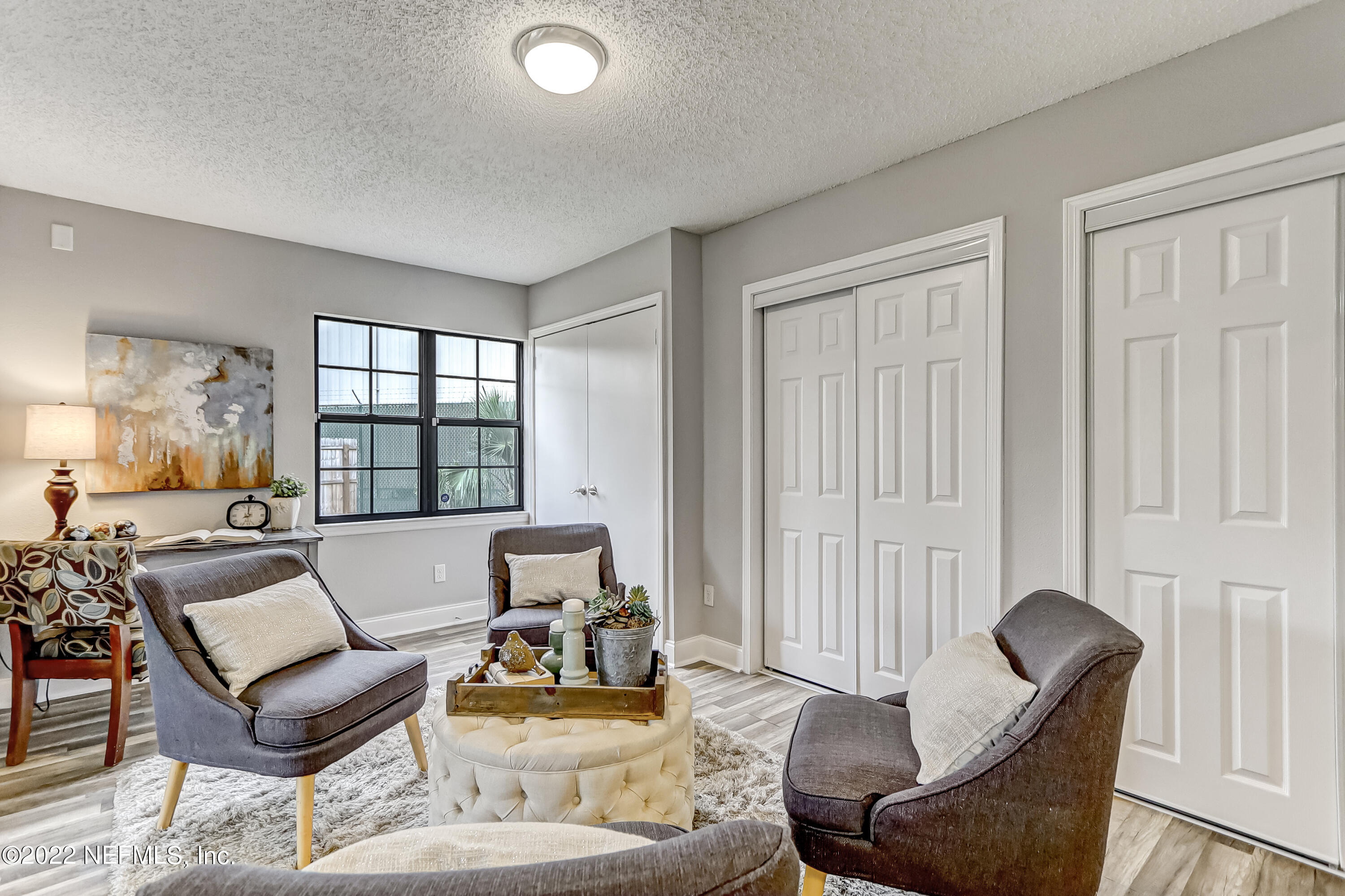 3607 Basil Road Jacksonville, FL 32207 - Photo 10 of 31 a living room with furniture and a large window