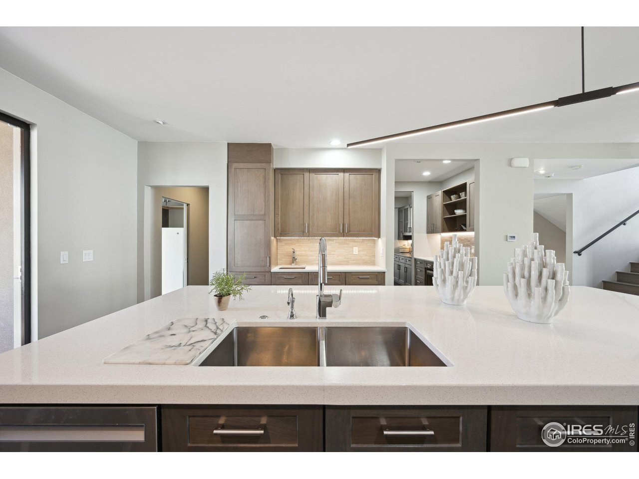 350 15th Street Boulder, CO 80302 - Photo 13 of 40 a view of a living room and kitchen