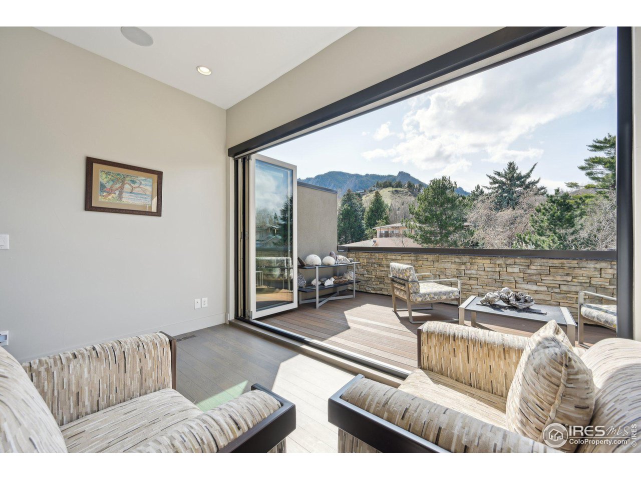 350 15th Street Boulder, CO 80302 - Photo 27 of 40 a living room with furniture and a large window