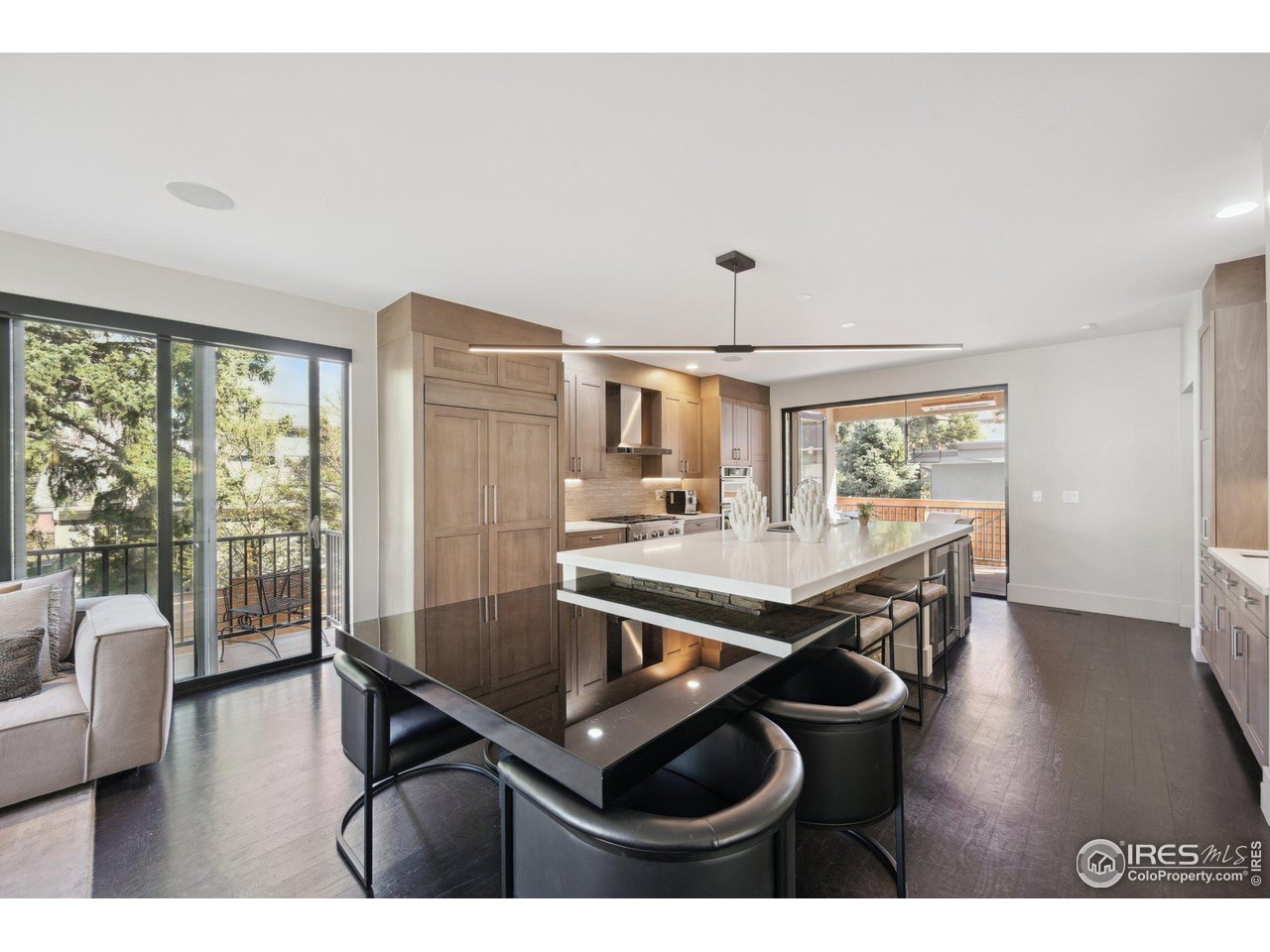 350 15th Street Boulder, CO 80302 - Photo 9 of 40 a dining room with furniture and wooden floor