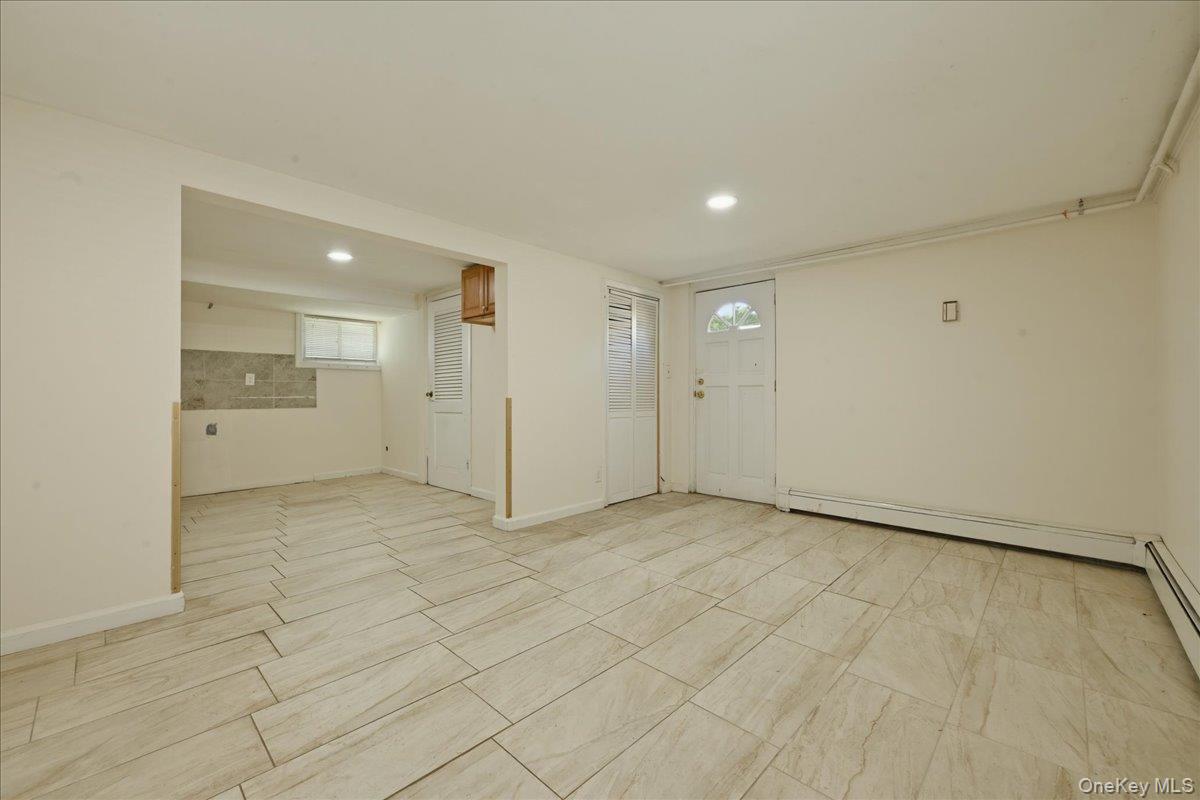 51 Hickory Road Port Washington, NY 11050 - Photo 13 of 16 Exit Door to Backyard