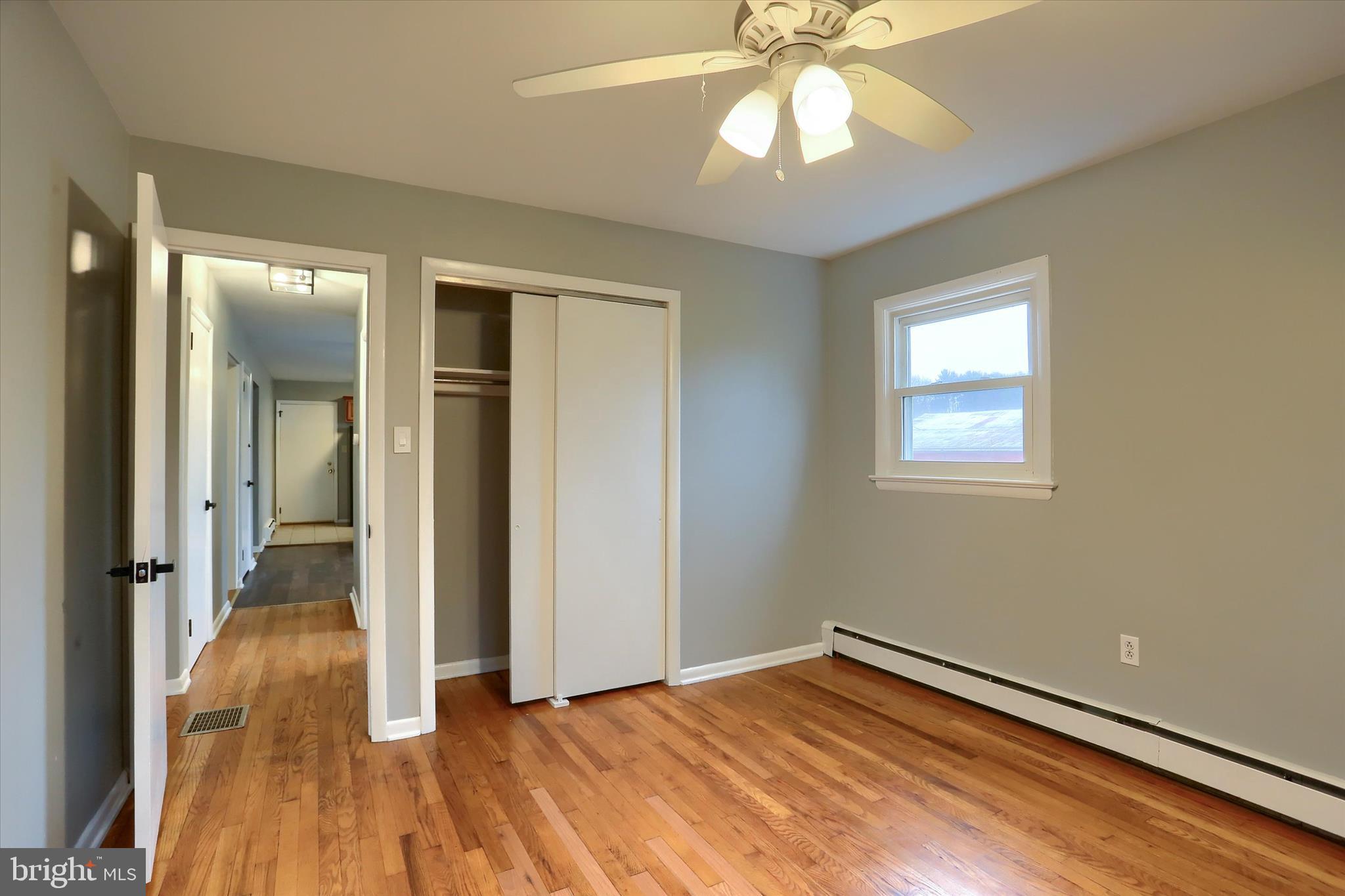685 Knight Road Harrisburg, PA 17111 - Photo 17 of 47 wooden floor in an empty room with a window