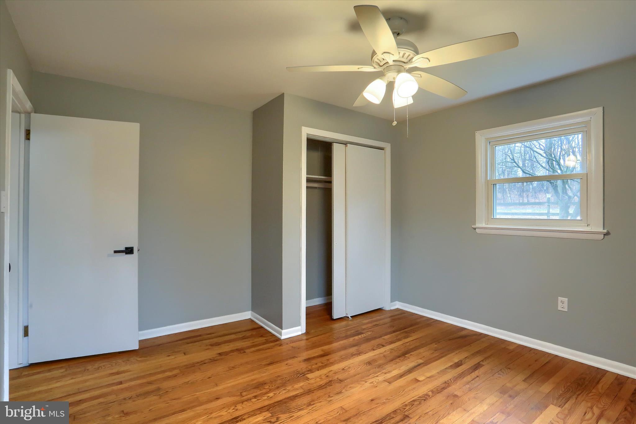 685 Knight Road Harrisburg, PA 17111 - Photo 20 of 47 a view of an empty room with wooden floor