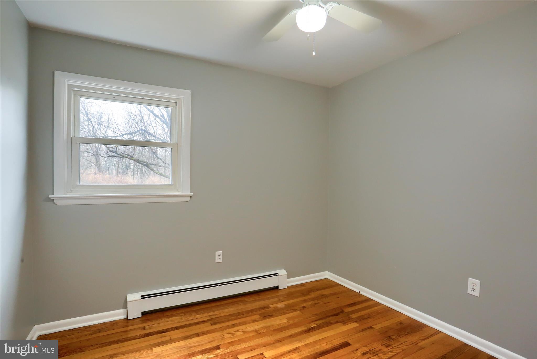 685 Knight Road Harrisburg, PA 17111 - Photo 21 of 47 a view of a room with wooden floor and a window