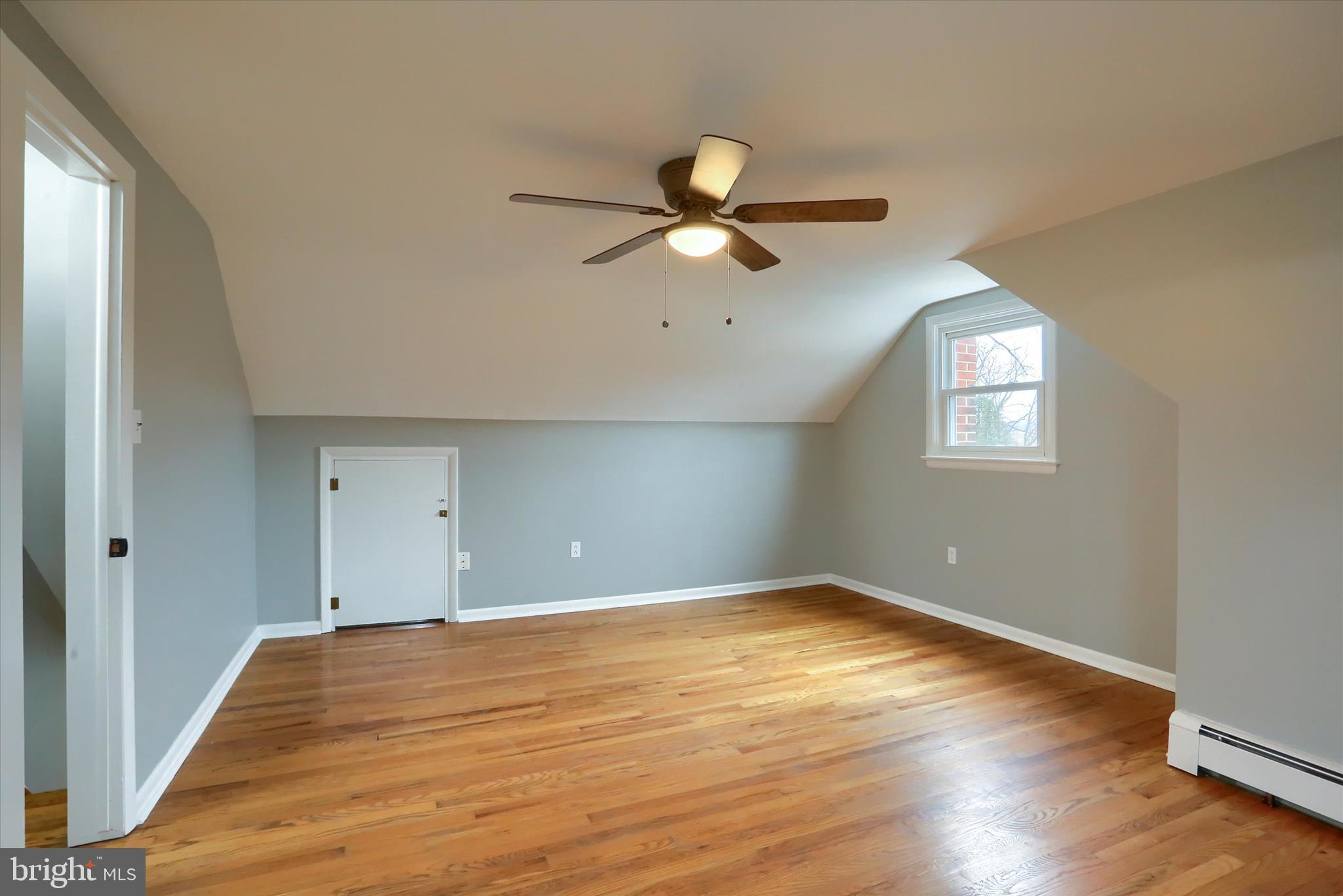685 Knight Road Harrisburg, PA 17111 - Photo 23 of 47 a view of empty room with wooden floor and fan