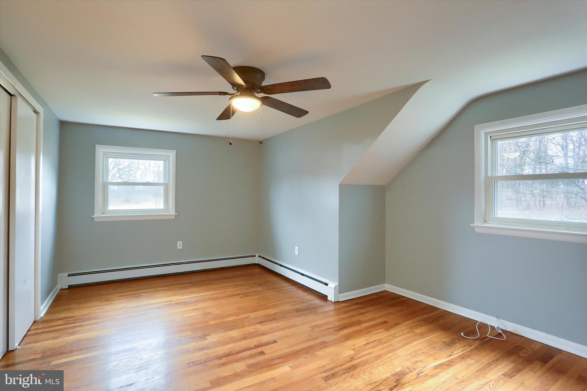 685 Knight Road Harrisburg, PA 17111 - Photo 33 of 47 a view of empty room with wooden floor and fan