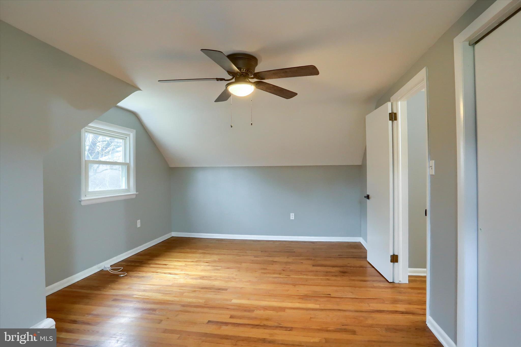 685 Knight Road Harrisburg, PA 17111 - Photo 34 of 47 a view of a room with wooden floor and a ceiling fan